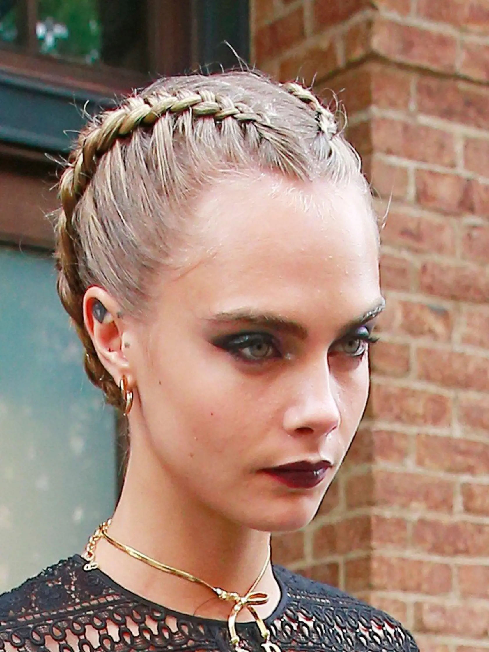 Cara Delevingne wears a Goth inspired sheer top showing her black bra paired with floral skirt and Christian Louboutin boots as she exits the Greenwich Hotel to promote "Suicide Squad" in New York City. Pictured: Cara Delevingne, Image: 295566855, License: Rights-managed, Restrictions: -ALLCOUNTRY,-xdmail,-xdmwkd,-XMAILO,-IREDLM,-xasso, Model Release: no, Credit line: Profimedia, Splash