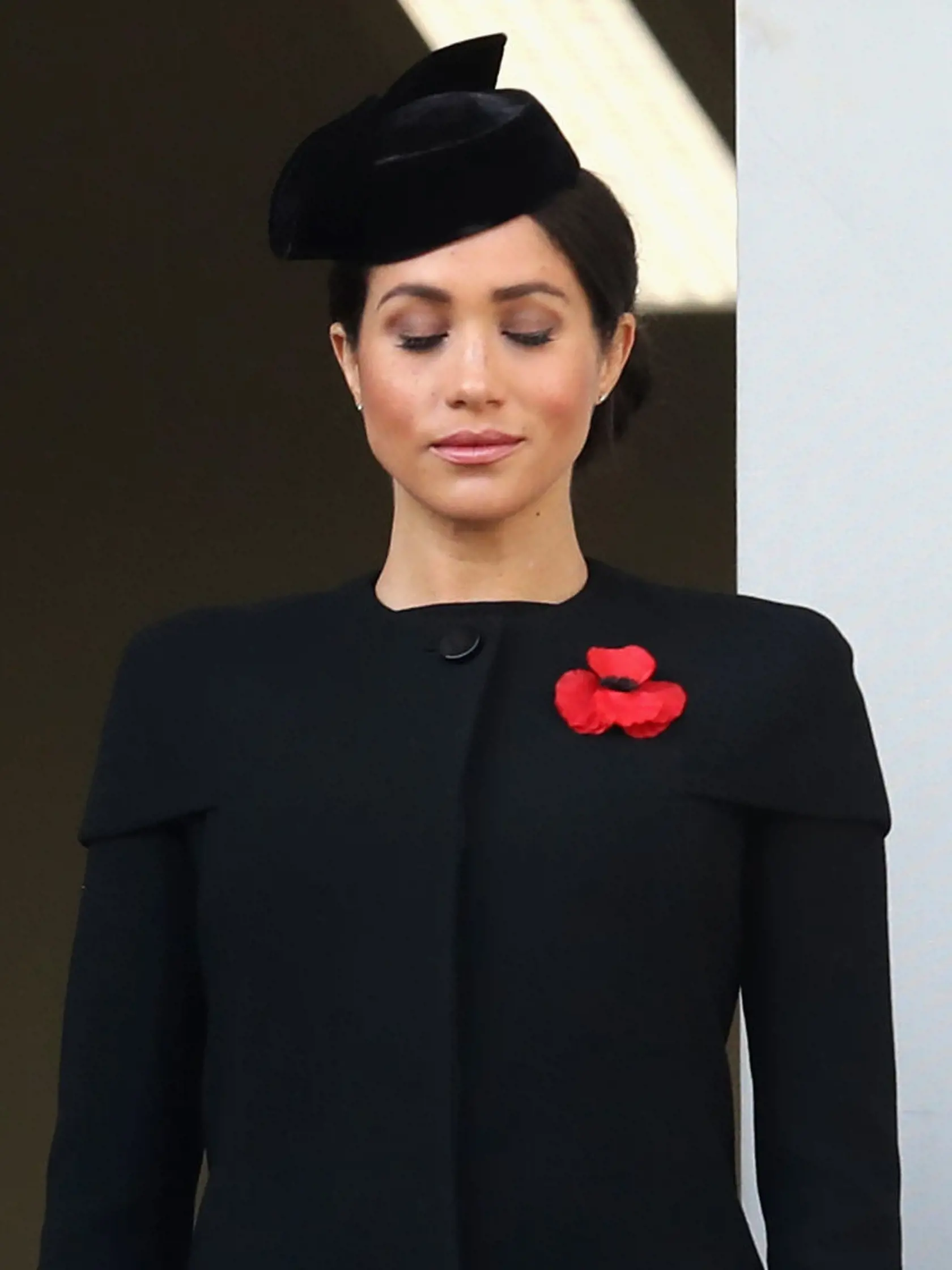 LONDON, ENGLAND - NOVEMBER 11:  Meghan, Duchess of Sussex attends the annual Remembrance Sunday memorial on November 11, 2018 in London, England. The armistice ending the First World War between the Allies and Germany was signed at Compiègne, France on eleventh hour of the eleventh day of the eleventh month - 11am on the 11th November 1918. This day is commemorated as Remembrance Day with special attention being paid for this year's centenary  (Photo by Chris Jackson/Getty Images)