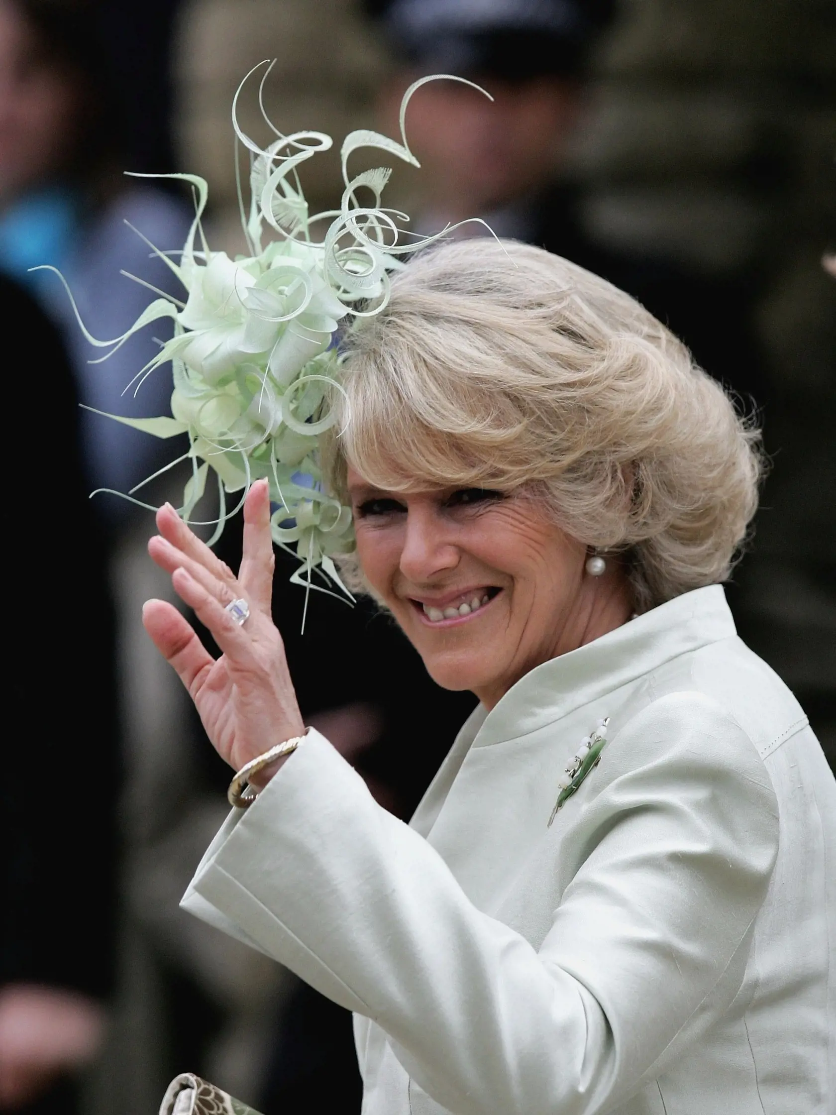 LACOCK, UNITED KINGDOM - MAY 06:  Camilla, Duchess of Cornwall arrives for Laura Parker Bowles wedding to Harry Lopes at St Cyriac's Church, Lacock on May 6, 2006 in Wiltshire, England. 26-year old Laura (daughter of Camilla and her former husband Andrew), and 29-year old Harry (nephew of the late Lord Roborough and grandson of the late Lord Astor of Hever) announced their engagement in November, having dated for nine years.  (Photo by Chris Jackson/Getty Images)