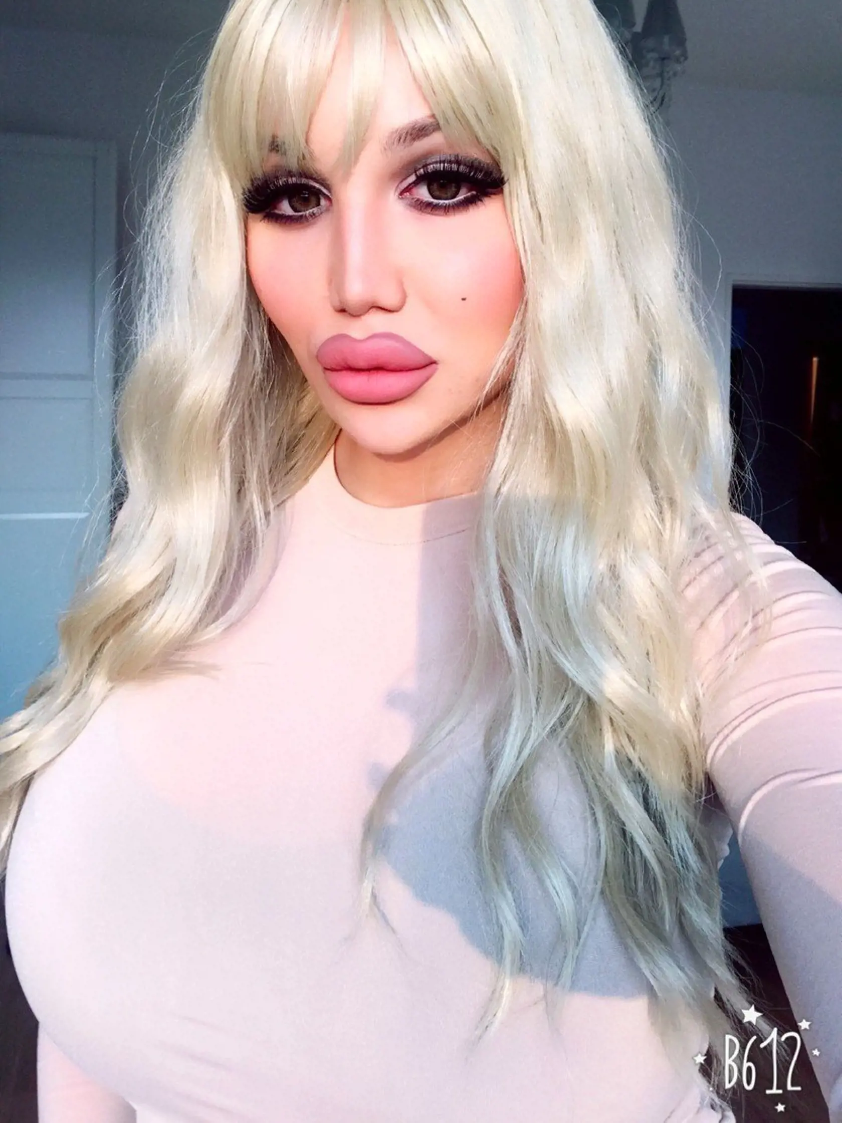 - (PICTURED: Ivana Vladislava, 26, from Berlin, Germany, who has spent over 110,000 to look like a plastic human doll. ) - A transgender woman has splashed out over 110,000 to look like a plastic human doll. Ivana Vladislava, 26, was originally born male but shortly after her 11th birthday she began taking female hormone tablets and dressed as a girl. Now, Ivana, from Berlin, Germany, has spent over 110,000 on cosmetic procedures to change her appearance from male to a female doll., Image: 36946