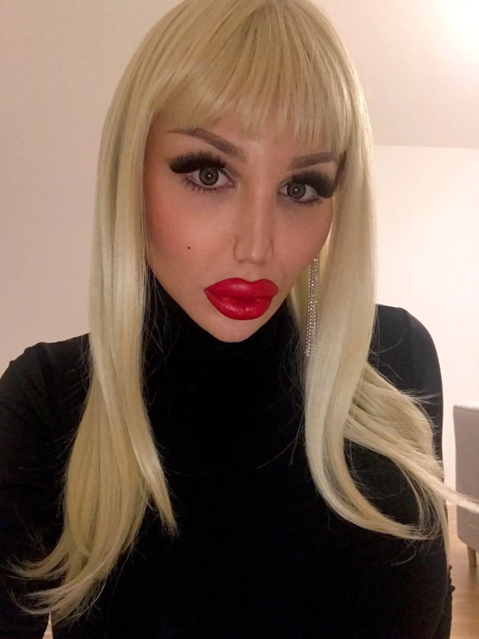 - (PICTURED: Ivana Vladislava, 26, from Berlin, Germany, who has spent over 110,000 to look like a plastic human doll. ) - A transgender woman has splashed out over 110,000 to look like a plastic human doll. Ivana Vladislava, 26, was originally born male but shortly after her 11th birthday she began taking female hormone tablets and dressed as a girl. Now, Ivana, from Berlin, Germany, has spent over 110,000 on cosmetic procedures to change her appearance from male to a female doll., Image: 36946