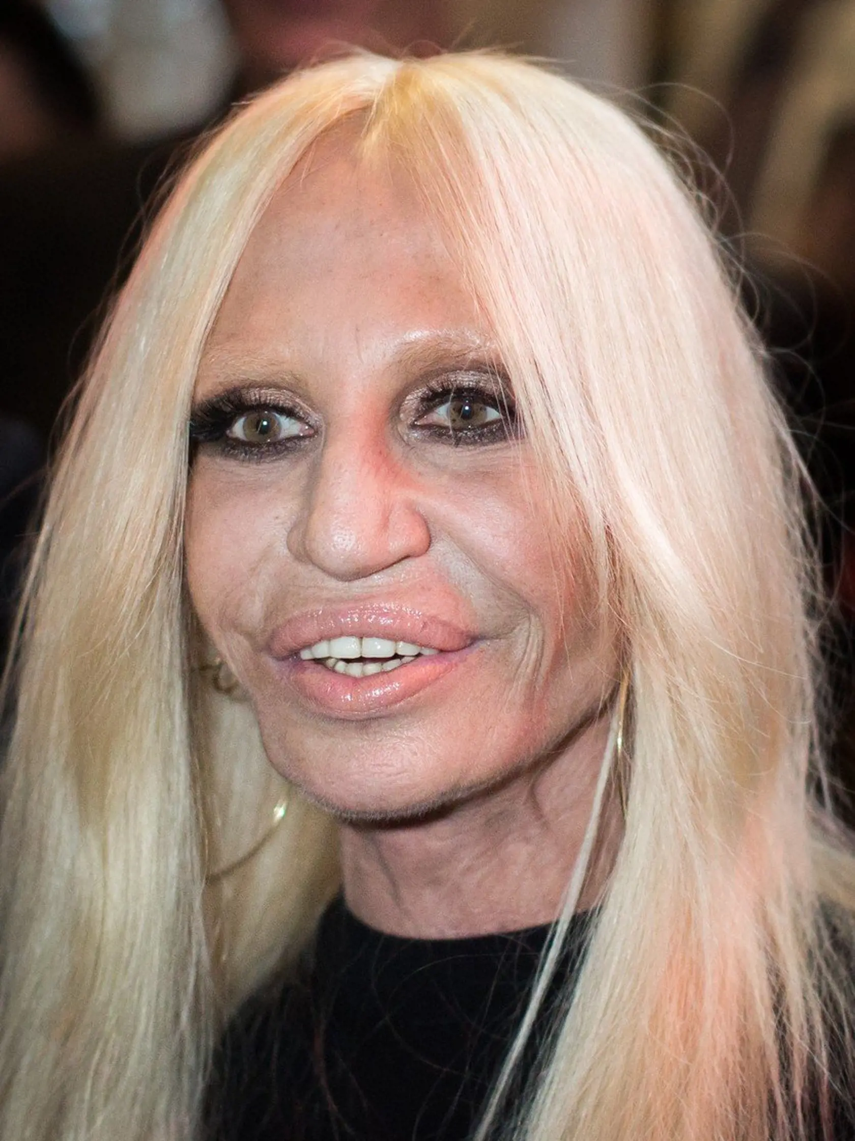 20 Sep 2014 - Milan - Italy  Donatella Versace leaving Versace Fashion Show during Milan Fashion Week Womenswear Spring/Summer 2015, Image: 205938348, License: Rights-managed, Restrictions: PLEASE CREDIT AS PER BYLINE *UK CLIENTS - PLEASE PIXELATE CHILDS FACE BEFORE PUBLICATION **UK CLIENTS MUST CALL PRIOR TO TV OR ONLINE USAGE, Model Release: no, Credit line: Profimedia, Xposurephotos