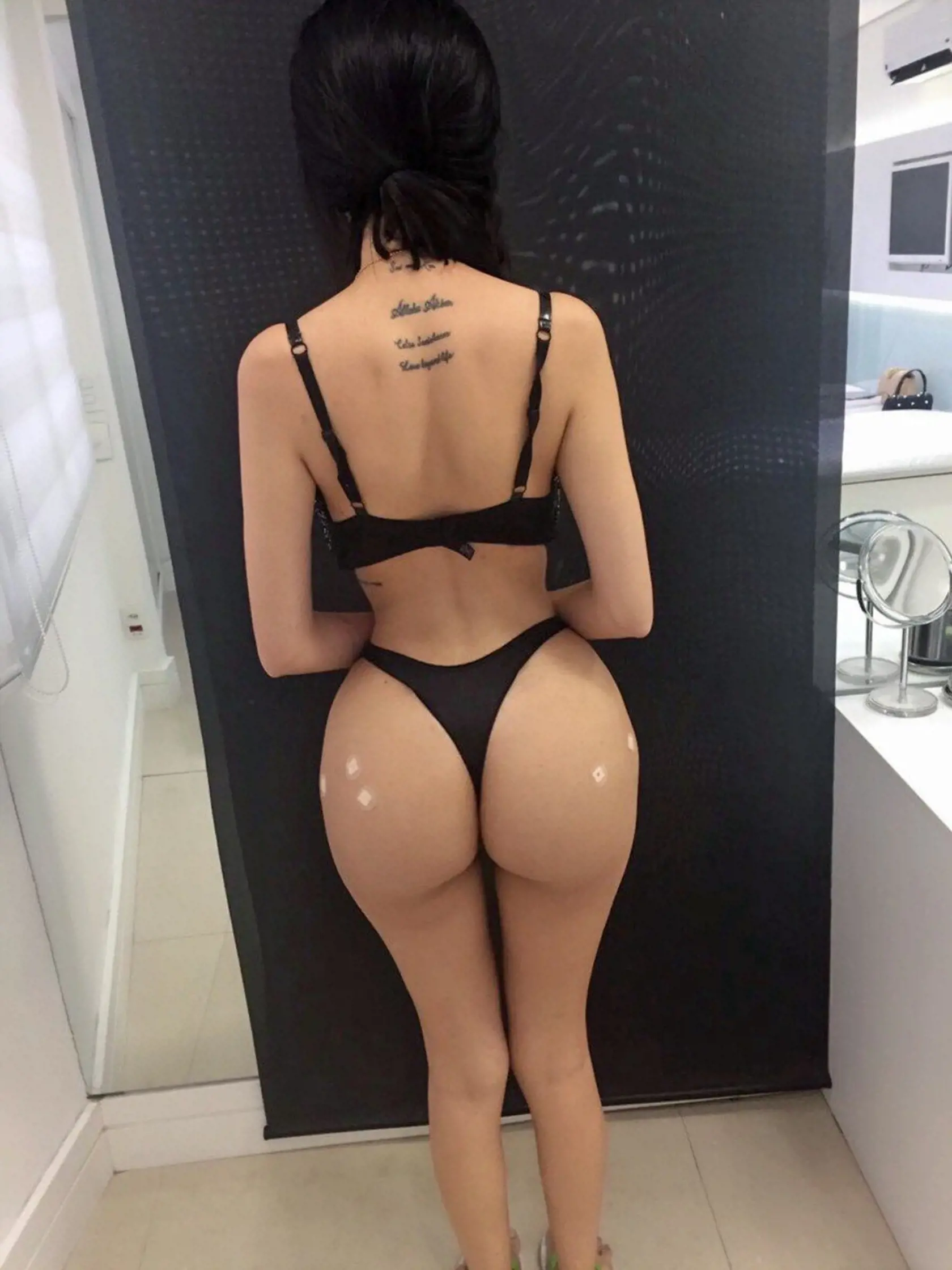 - (PICTURED: Jennifer after recent butt implant, shes had 500ml of fat injected - Jennifer has had over 180kUSD of surgery so far to look like kim kardashian-west including ribs remove, breast implants, butt implants and more) - A model who spent 180,000USD (140,000GBP) to look like Kim Kardashian-West has imitated her idols iconic naked photoshoot in the desert. Jennifer Pamplona, 24, posed on scorching sand showing off her derriere and curvaceous figure in the saucy shots in Las Vegas in Nevad