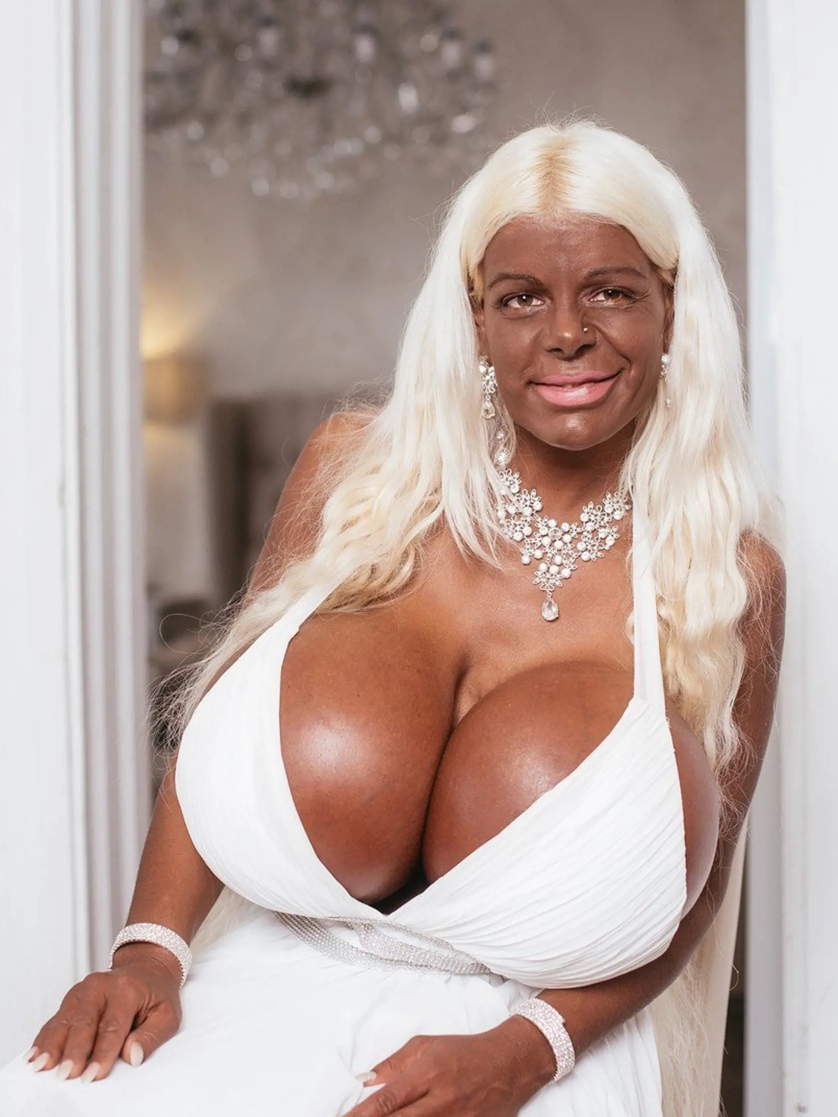 *** EXCLUSIVE - VIDEO AVAILABLE ***  TRIER, GERMANY - MARCH 21: Martina Big poses for a photograph at her home, on March 21, 2017 in Trier, Germany.  Busty German glamour model Martina Big has shocked her fans with a new â€˜extreme tanâ€™ that has turned her fair skin to â€˜dark crispy brownâ€™ with just three tanning injections. The model - who claims her size 32 S breasts are the biggest in Europe - has had tanning injections to turn her white Caucasian skin a deep shade of mahogany brown. And