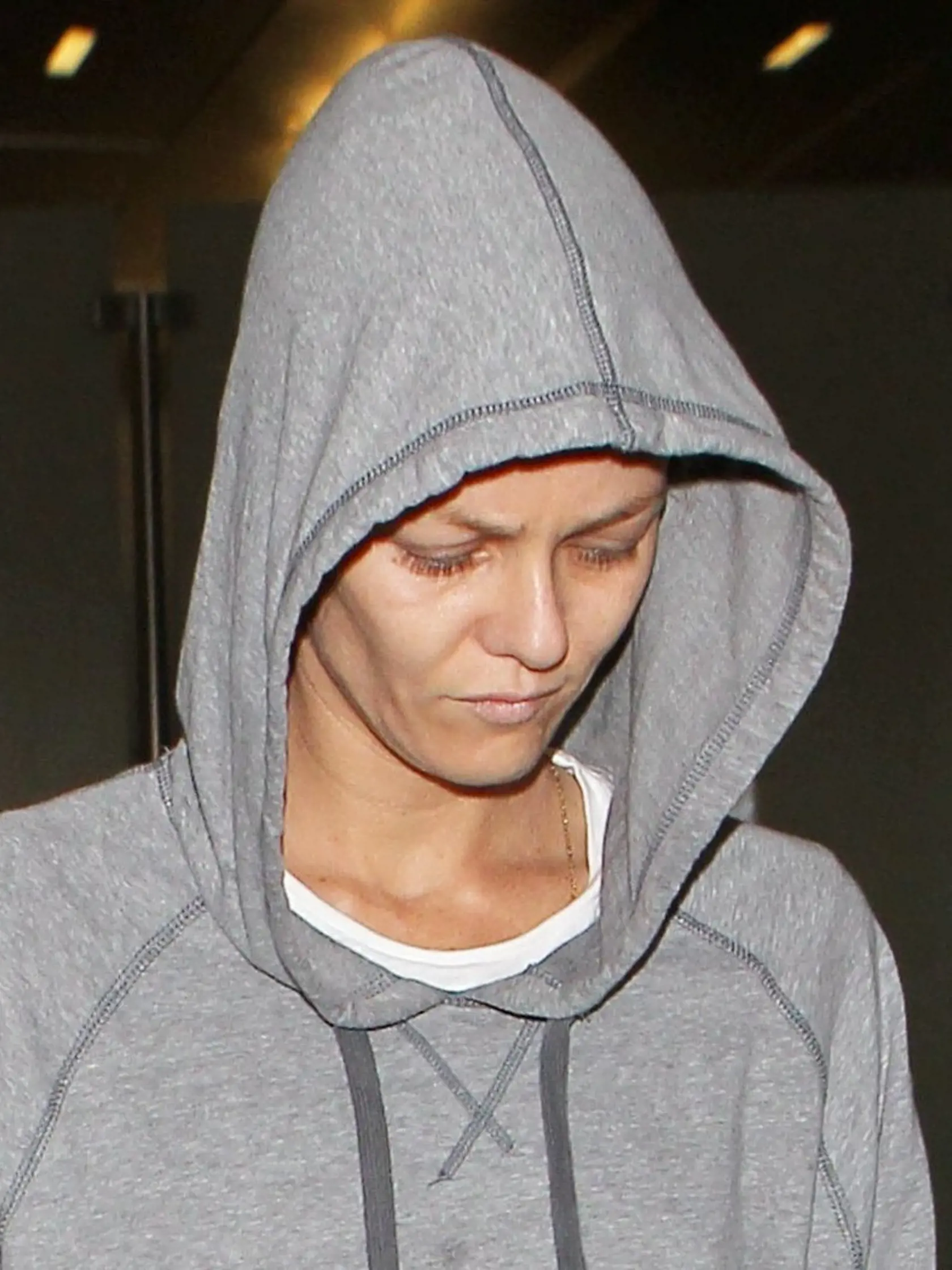 Vanessa Paradis at LAX looking rough withan over sized sweatshirt with stains and a gaunt face.  August 4, 2014, Image: 200580695, License: Rights-managed, Restrictions: , Model Release: no, Credit line: Profimedia, X17