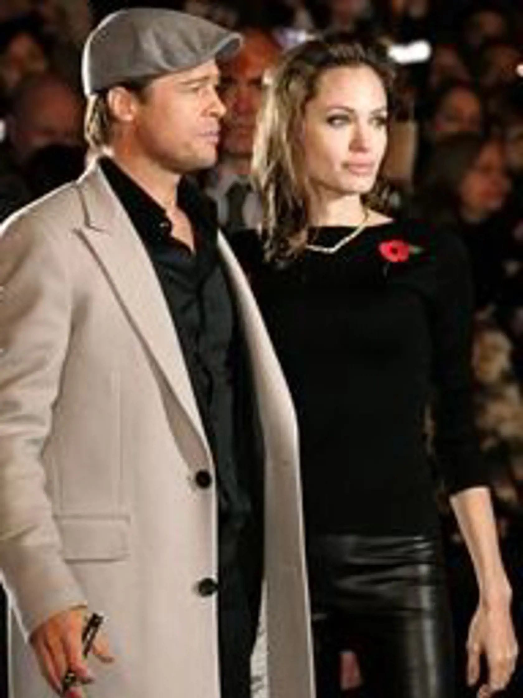 U.S. actors Brad Pitt and Angelina Jolie attend the European premiere of Beowulf in London, Sunday, Nov. 11, 2007. (AP Photo/Nathan Strange)