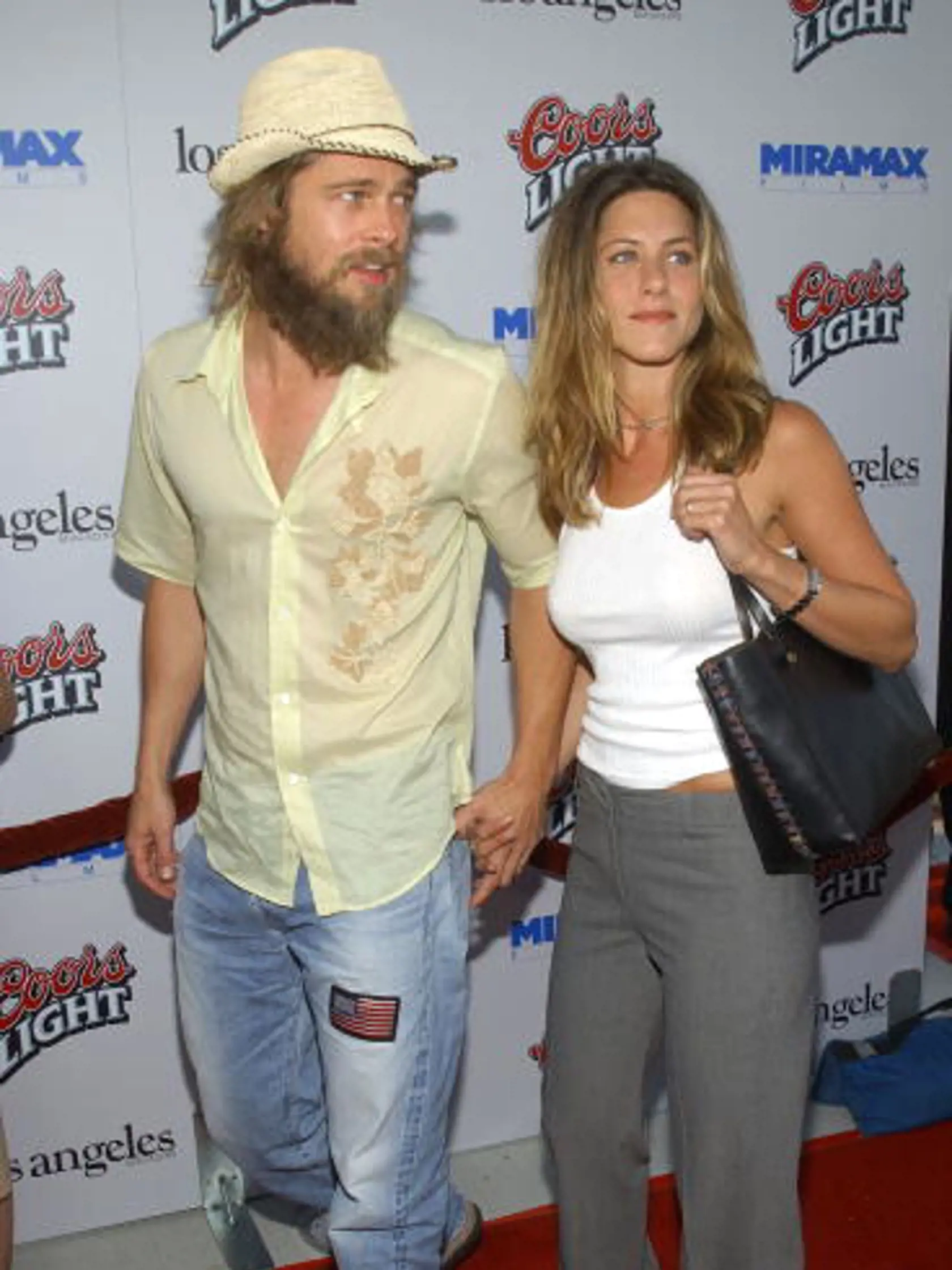 LOS ANGELES, CA - JULY 23:  Actors Brad Pitt and wife Jennifer Aniston attend the premiere of director Steven Soderbergh's new film "Full Frontal" on July 23, 2002 in Los Angeles, California.  (Photo by Vince Bucci/Getty Images)