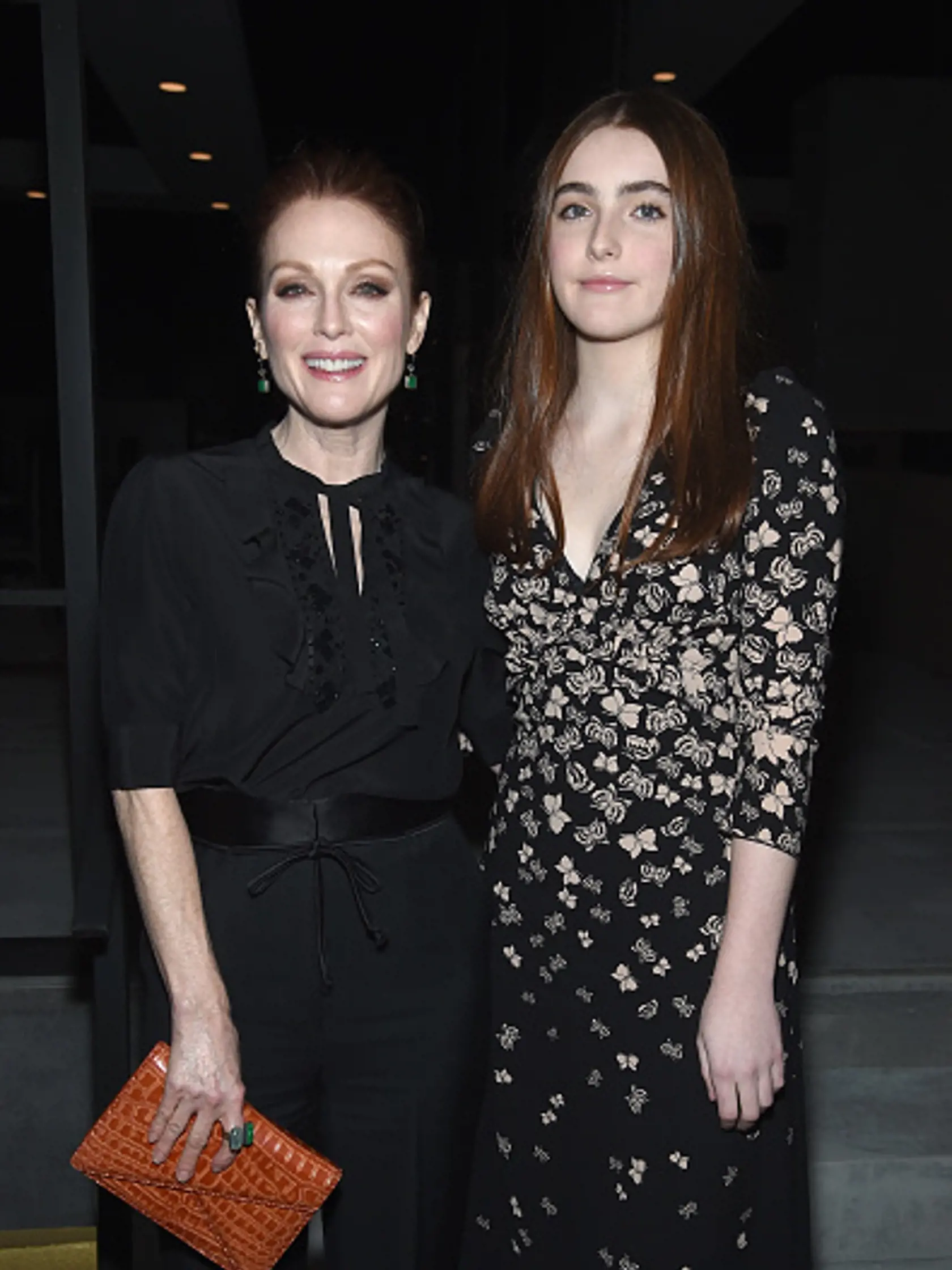 NEW YORK, NY - FEBRUARY 09:  Actor Julianne Moore and daughter Liv Freundlich attend the Bottega Veneta Fall/Winter 2018 fashion show at New York Stock Exchange on February 9, 2018 in New York City.  (Photo by Jamie McCarthy/Getty Images for Bottega Veneta)