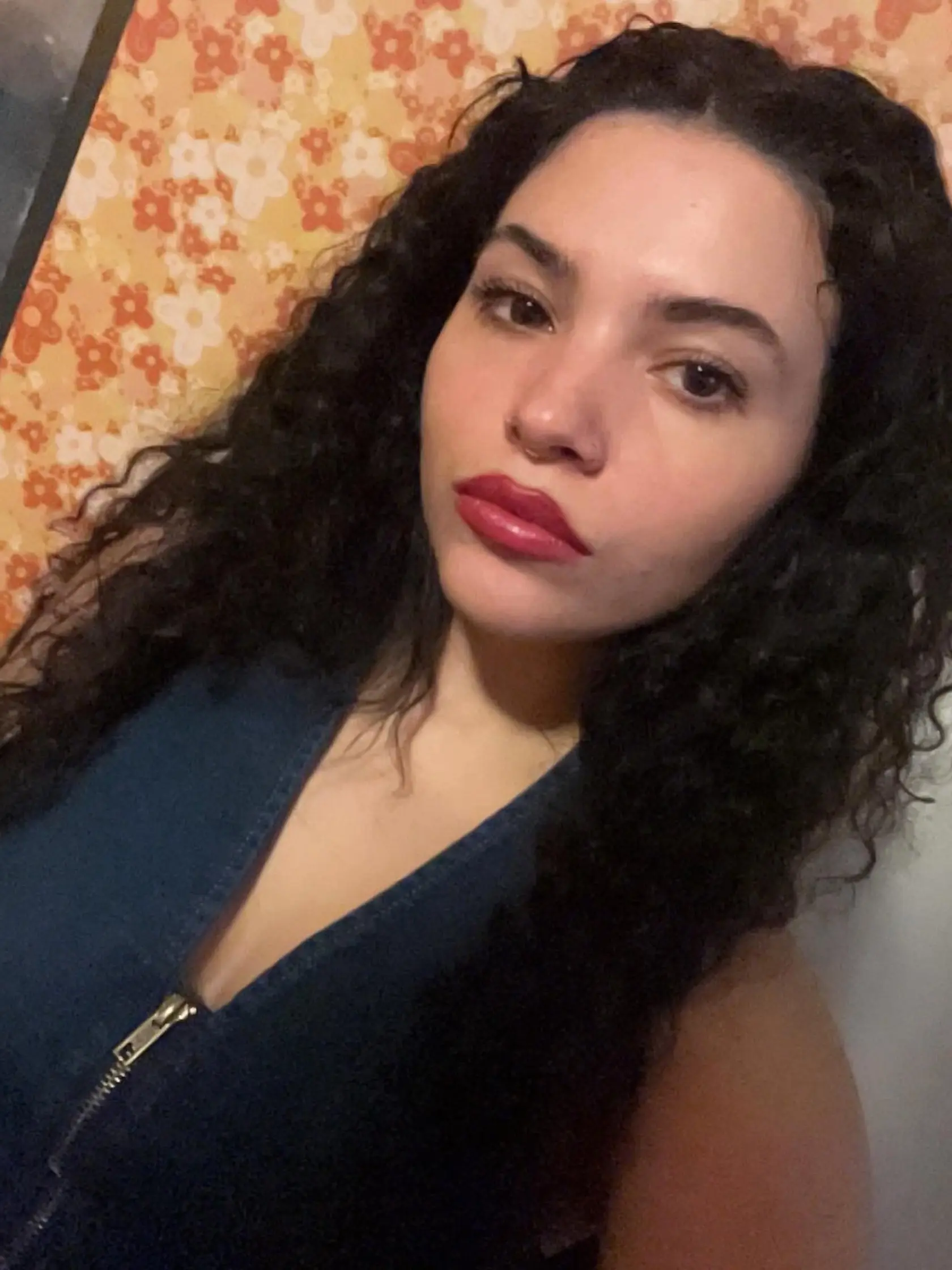 Dcéra speváka Davida Bowieho a modelky Iman. Krásu zdedila po mame, talent po otcovi.