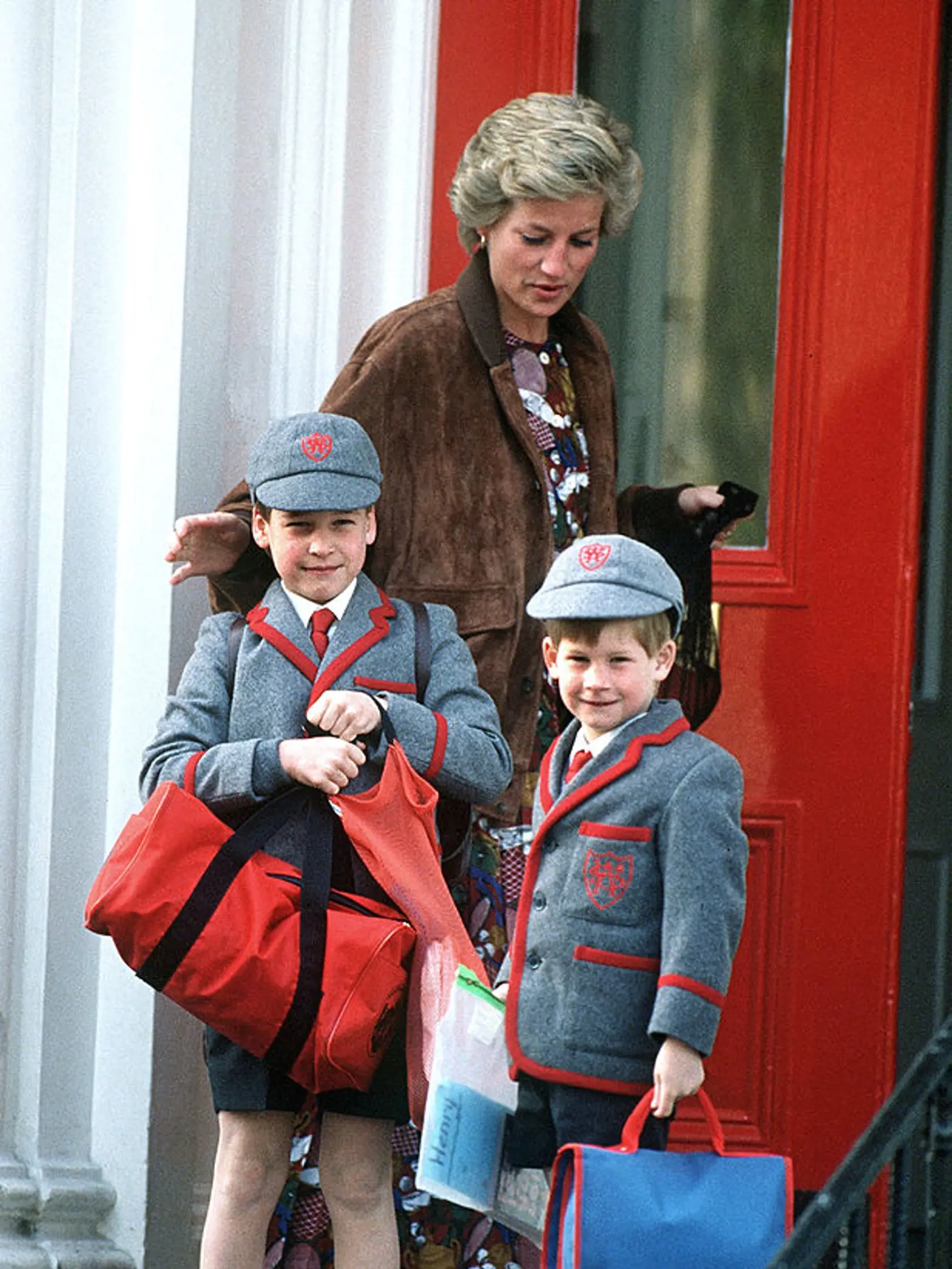 The Princess of Wales outside Wetherby School in London, with her sons William and Harry, April 1990. (Photo by Jayne Fincher/Princess Diana Archive/Getty Images)