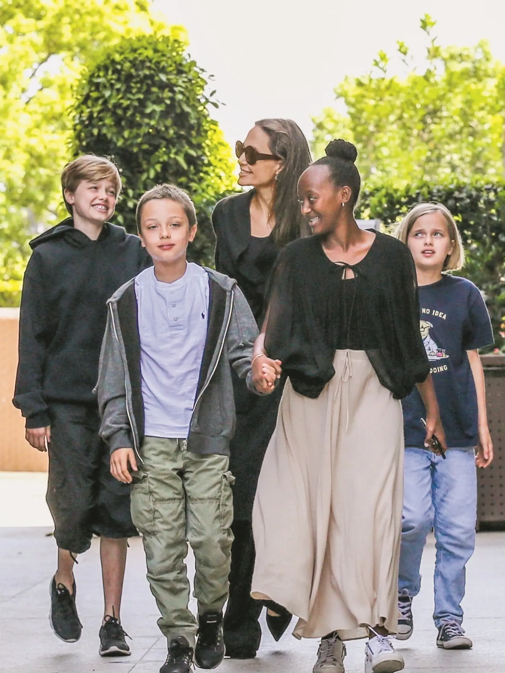 Los Angeles, CA  - Angelina Jolie and four of her kids are seen exiting a movie theater. The divorce between Angelina and Brad Pitt is still far from being settled, with news of custody issues over visitation rights.

Pictured: Angelina Jolie, Vivienne Jolie-Pitt, Zahara Jolie-Pitt, Knox Leon Jolie-Pitt, Shiloh Jolie-Pitt



*UK Clients - Pictures Containing Children
Please Pixelate Face Prior To Publication*, Image: 383083134, License: Rights-managed, Restrictions: , Model Release: no, Credit l