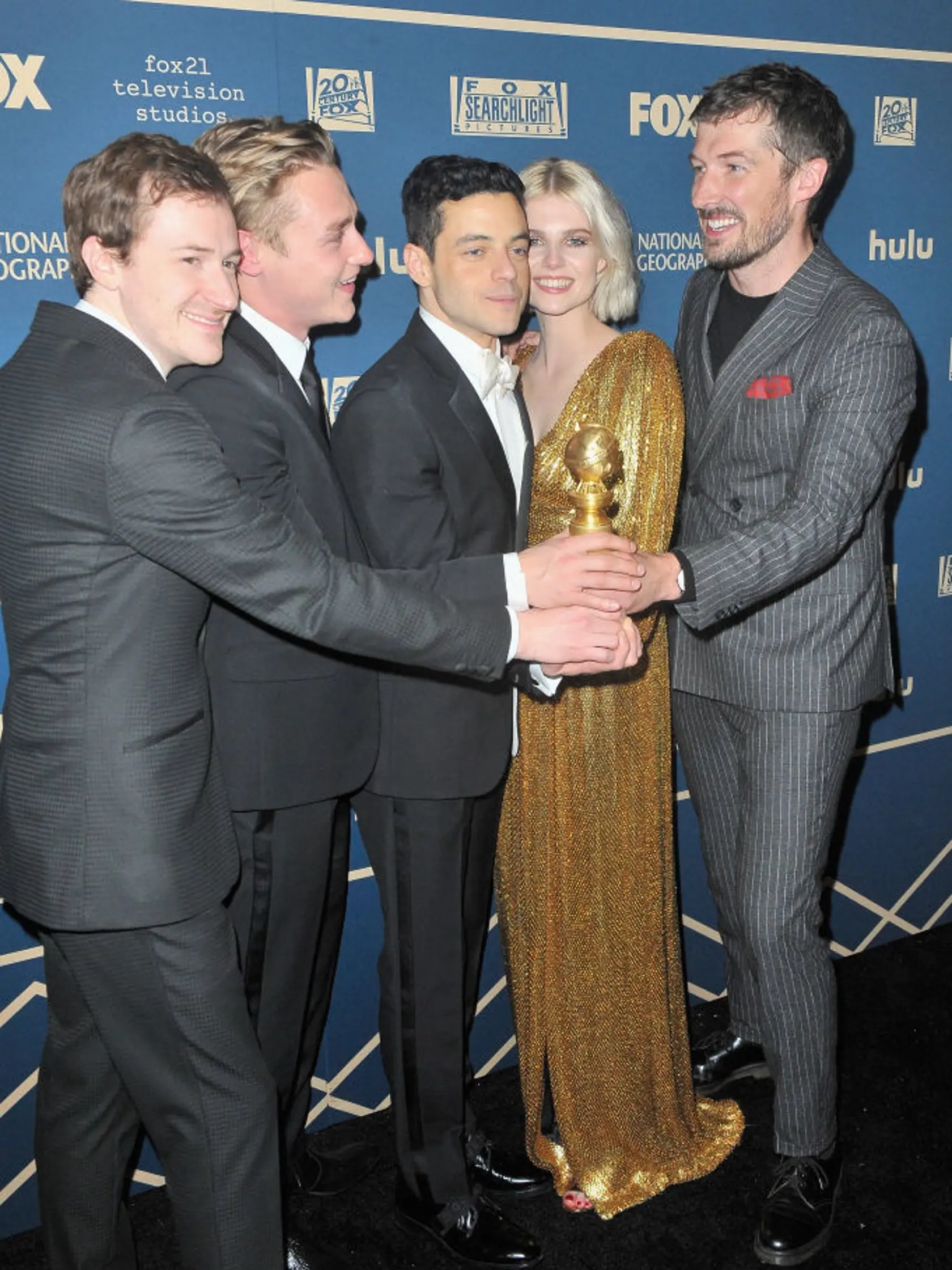 BEVERLY HILLS, CA - JANUARY 06:  (L-R) Joseph Mazzello, Ben Hardy, Rami Malek (winner of Best Performance by an Actor in a Motion Picture ? Drama), Lucy Boynton, and Gwilym Lee attend the FOX, FX And Hulu 2019 Golden Globe Awards After Party at The Beverly Hilton Hotel on January 6, 2019 in Beverly Hills, California.  (Photo by Jerod Harris/Getty Images)