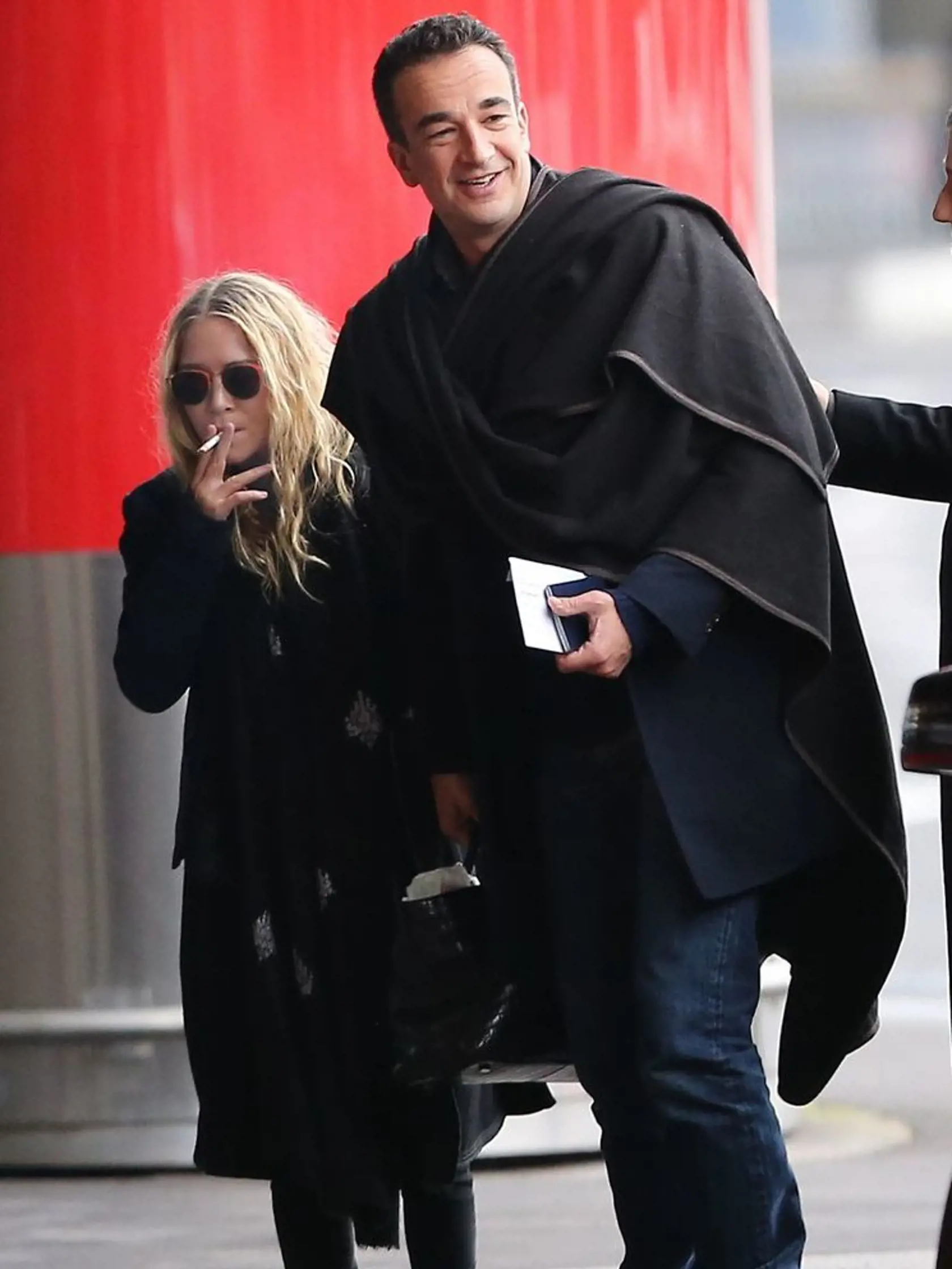 Exclusive... 50984049 Actress and fashionista Mary-Kate Olsen departing on a flight at Roissy airport in Paris, France with her much older French boyfriend Olivier Sarkozy on January 6th, 2013. The happy couple aren't afraid to show some PDA while they wait for their flight. No Internet Use Without Prior Agreement  FameFlynet, Inc - Beverly Hills, CA, USA - +1 (818) 307-4813 RESTRICTIONS APPLY: USA/AUSTRALIA ONLY
