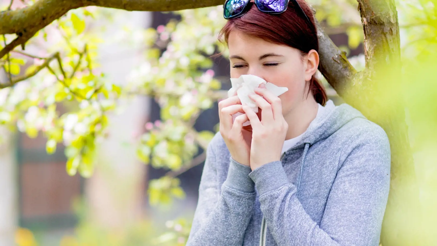 Young,Woman,Suffering,From,Pollen,Allergy,,Allergy,Season,,Girl,Blowing