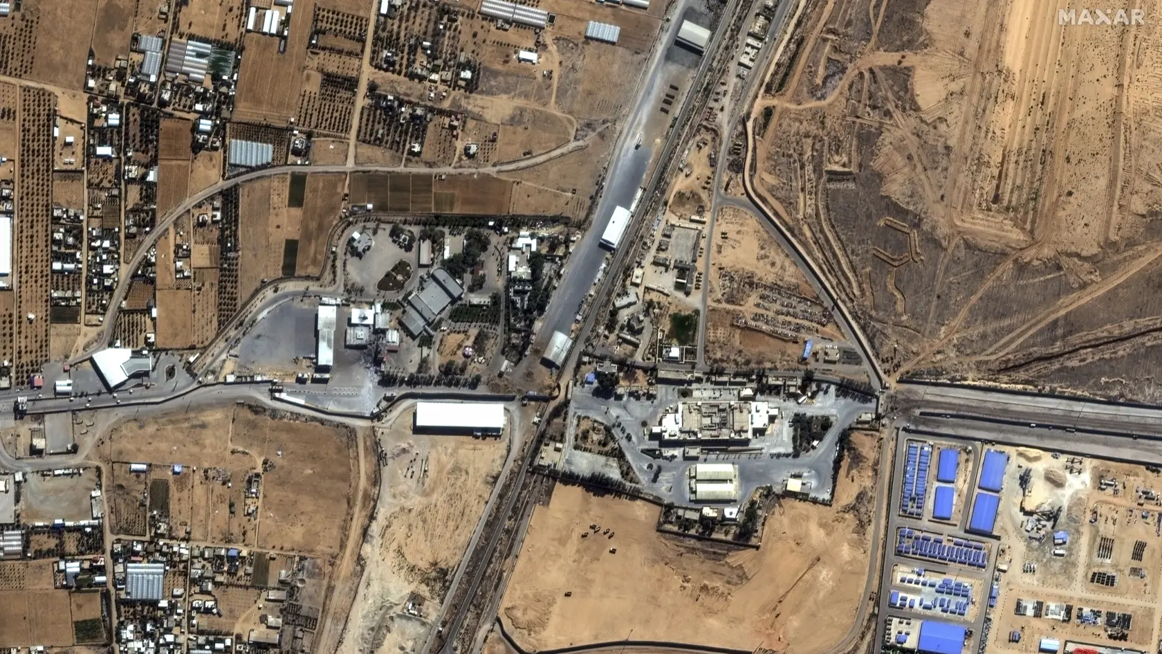 JB 6 Rafah - Na satelitnej snímke zverejnenej Maxar Technologies pohľad na hraničný priechod Rafah medzi Gazou a Egyptom 15. októbra 2023. FOTO TASR/AP

This image provided by Maxar Technologies, shows the Rafah Border crossing between Gaza, and Egypt, Sunday, Oct. 15, 2023. (Satellite image Â©2023 Maxar Technologies via AP)
