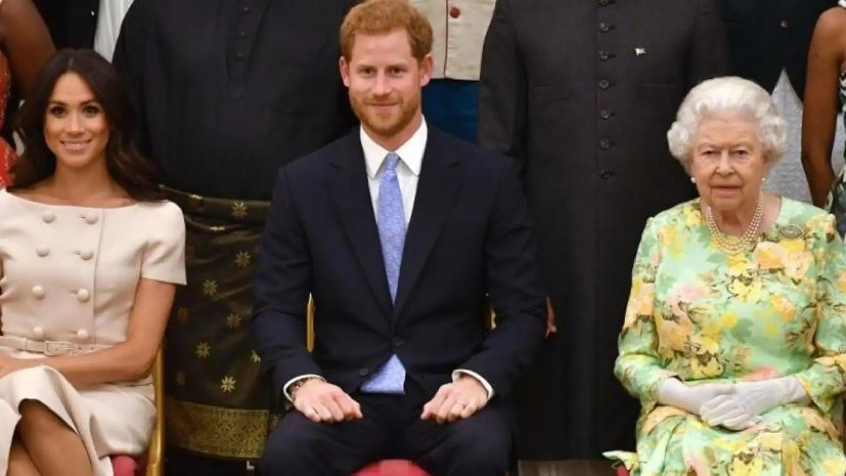 Meghan Markle, princ Harry a kráľovná Alžbeta II.