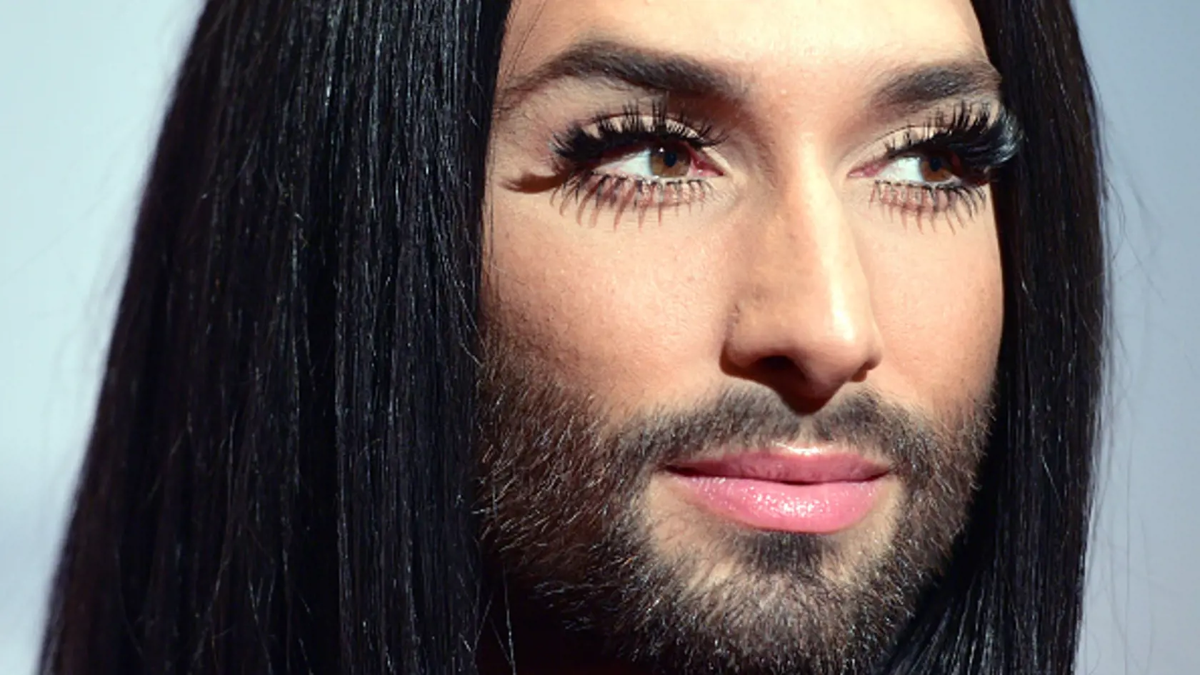 FRANKFURT AM MAIN, GERMANY - OCTOBER 13:  Conchita Wurst poses on the red carpet before the opening ceremony of the 2015 Frankfurt Book Fair (Frankfurter Buchmesse) on October 13, 2015 in Frankfurt am Main, Germany. The 2015 fair, which is among the world's largest book fairs, will be open to the public from October 13-18.  (Photo by Thomas Lohnes/Getty Images)