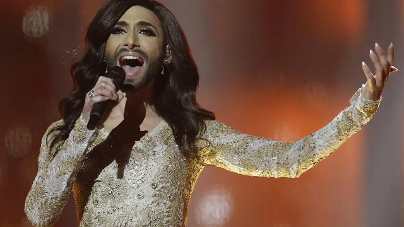 Singer Conchita Wurst representing Austria performs the song ' Rise Like a Phoenix' during a rehearsal for the second semifinal of the Eurovision Song Contest in the B&W Halls in Copenhagen, Denmark, Wednesday, May 7, 2014.  Conchita Wurst also known by his birth-name Thomas Neuwirth.  Challenging conceptions of masculine and feminine beauty, Wurst seems to have stolen the limelight ahead of the televised extravaganza, with a potential worldwide audience of some 170 million viewers, sporting lon