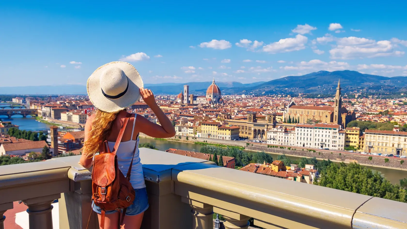 Happy woman with arms raised up enjoying panoramic of Florence Cityscape- tour tourism,travel,vacation in Italy-Europe, Firenze