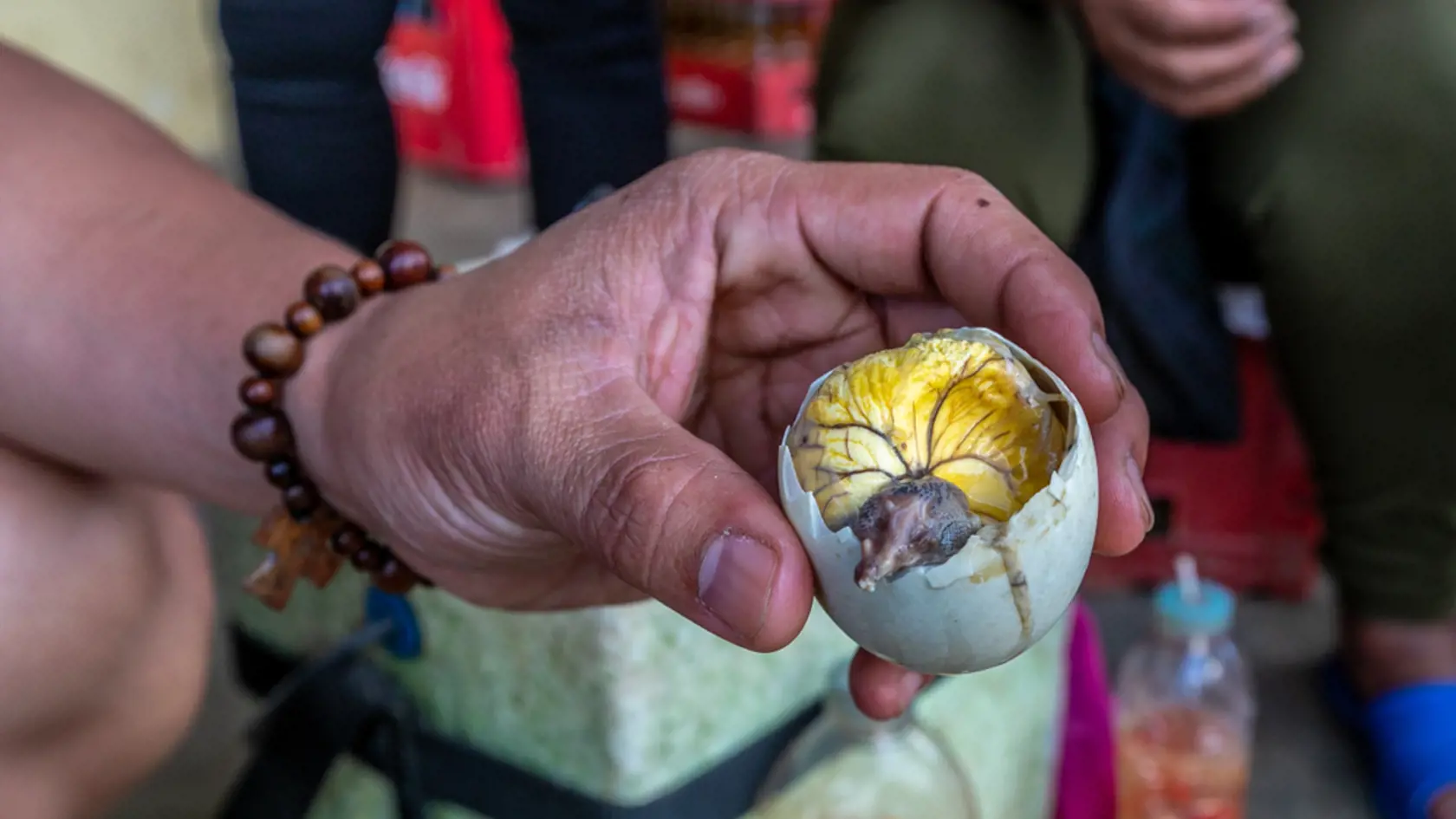 Balut egg - boiled egg with a little duckling or chicken.