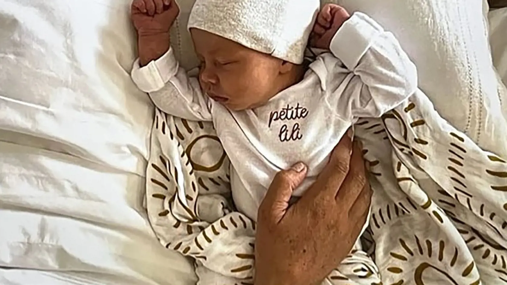 Harry a Meghan zverejnili doteraz nepublikované fotografie dcérky Lilibet