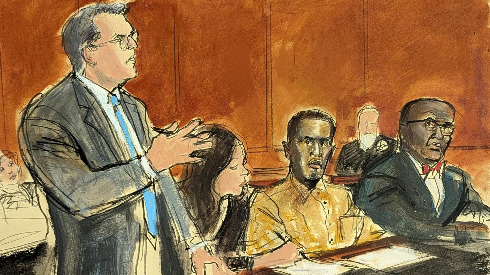 Na kresbe zo súdnej siene americký raper Sean "Diddy" Combs (druhý vpravo), jeho obhajca Marc Agnifilo (vľavo) počas pojednávania na federálnom súde 10. októbra 2024 v New Yorku. Americký raper Sean "Diddy" Combs sa 5. mája budúceho roka postaví pred federálny súd pre obvinenia z obchodovania s bielym mäsom a vydierania. Combs je od svojho zadržania v polovici septembra vo väzbe.