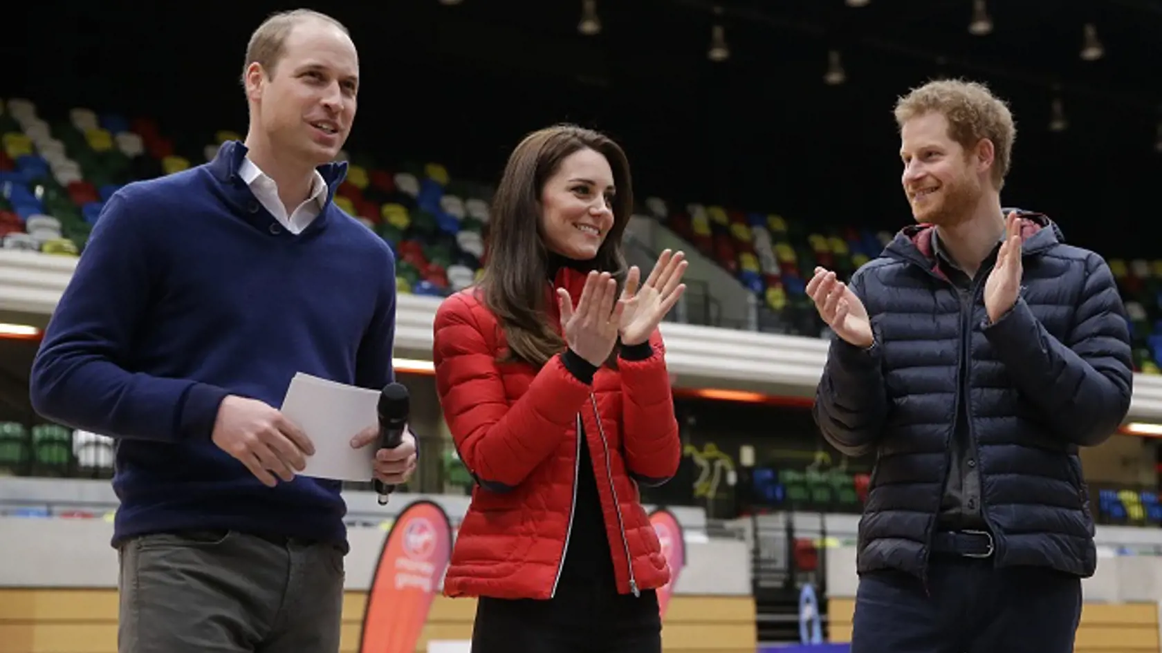 Kate, the Duchess of Cambridge, centre and Prince Harry, right, applaud Prince William after he spoke, during a training event to promote the charity Heads Together, at the Queen Elizabeth II Park in London, Sunday, Feb. 5, 2017. (AP Photo/Alastair Grant, Pool)