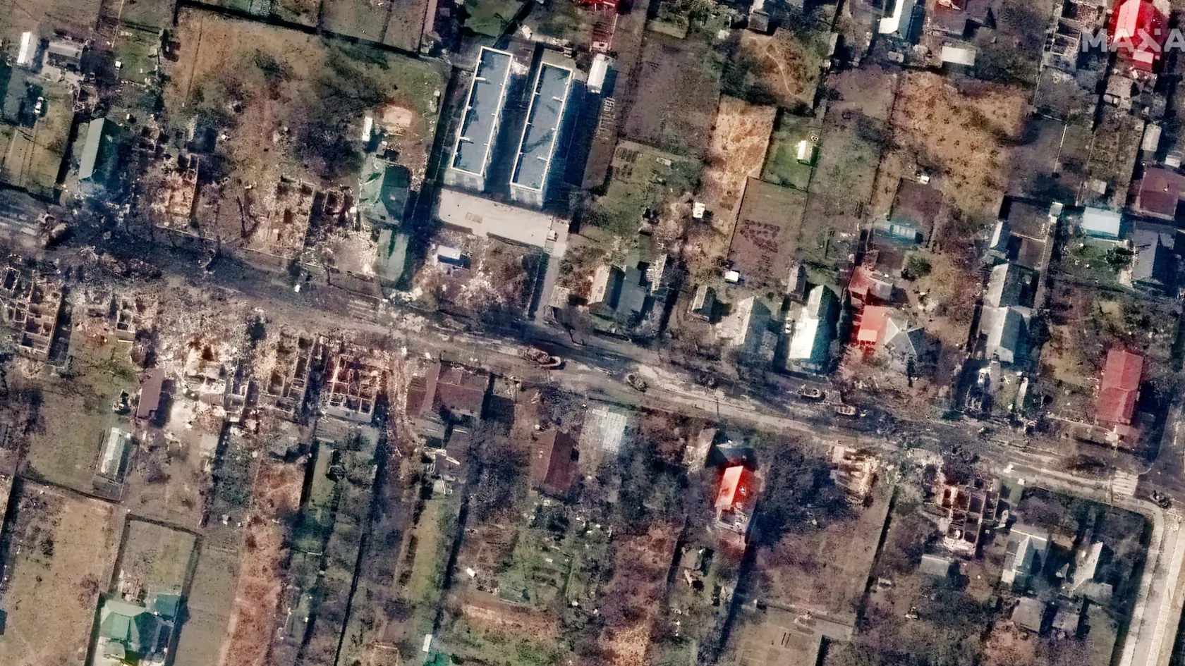 WA 8 Buča - Na satelitnej snímke sú zničené domy a vozidlá na ulici v ukrajinskom meste Buča, ktoré sa nachádza pri Kyjeve 31. marca 2022. FOTO TASR/AP

  
This satellite image provided by Maxar Technologies shows an overview of destroyed houses and vehicles in a street in Bucha, Ukraine on Thursday March 31, 2022. (Satellite image Â©2022 Maxar Technologies via AP)