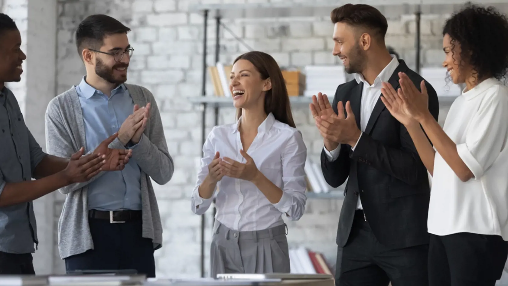 Friendly,Diverse,Employees,Congratulating,Businesswoman,With,Business,Achievement,,Great,Work