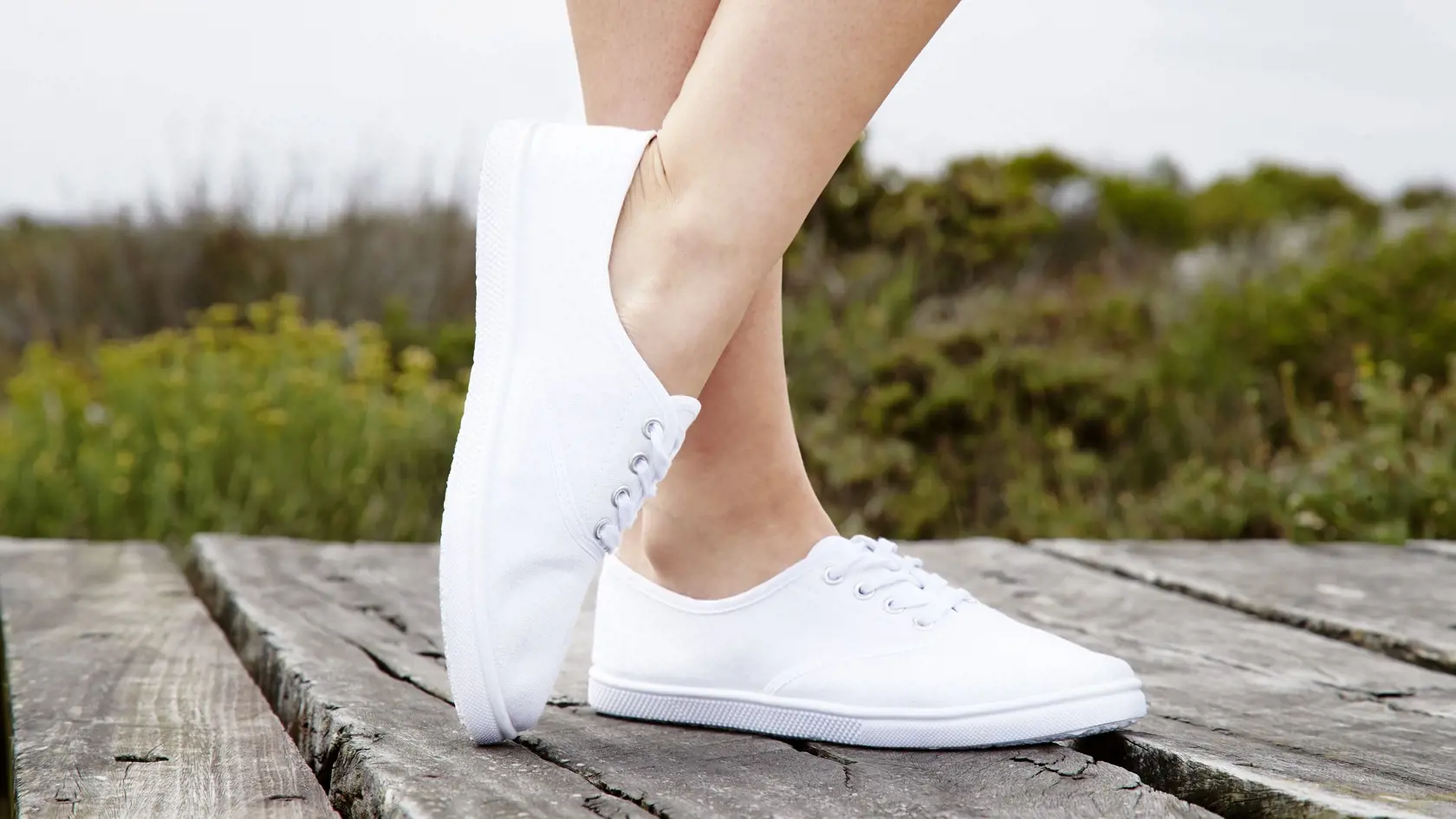 Model in white sneakers