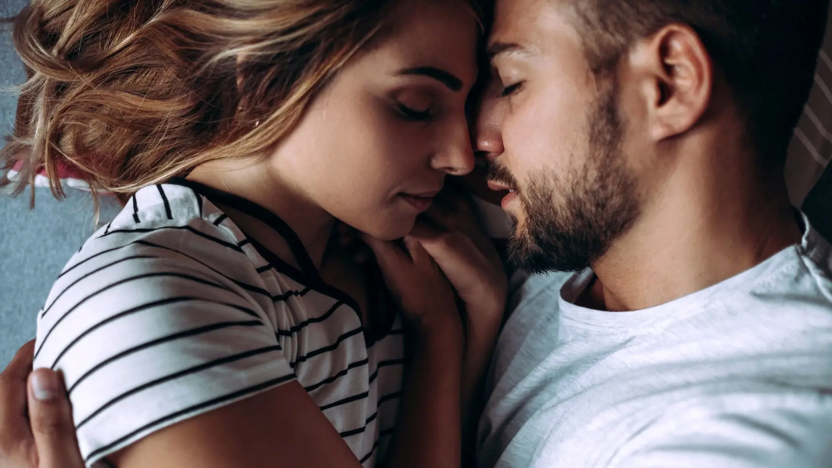 Loving Couple In Consoling Embrace