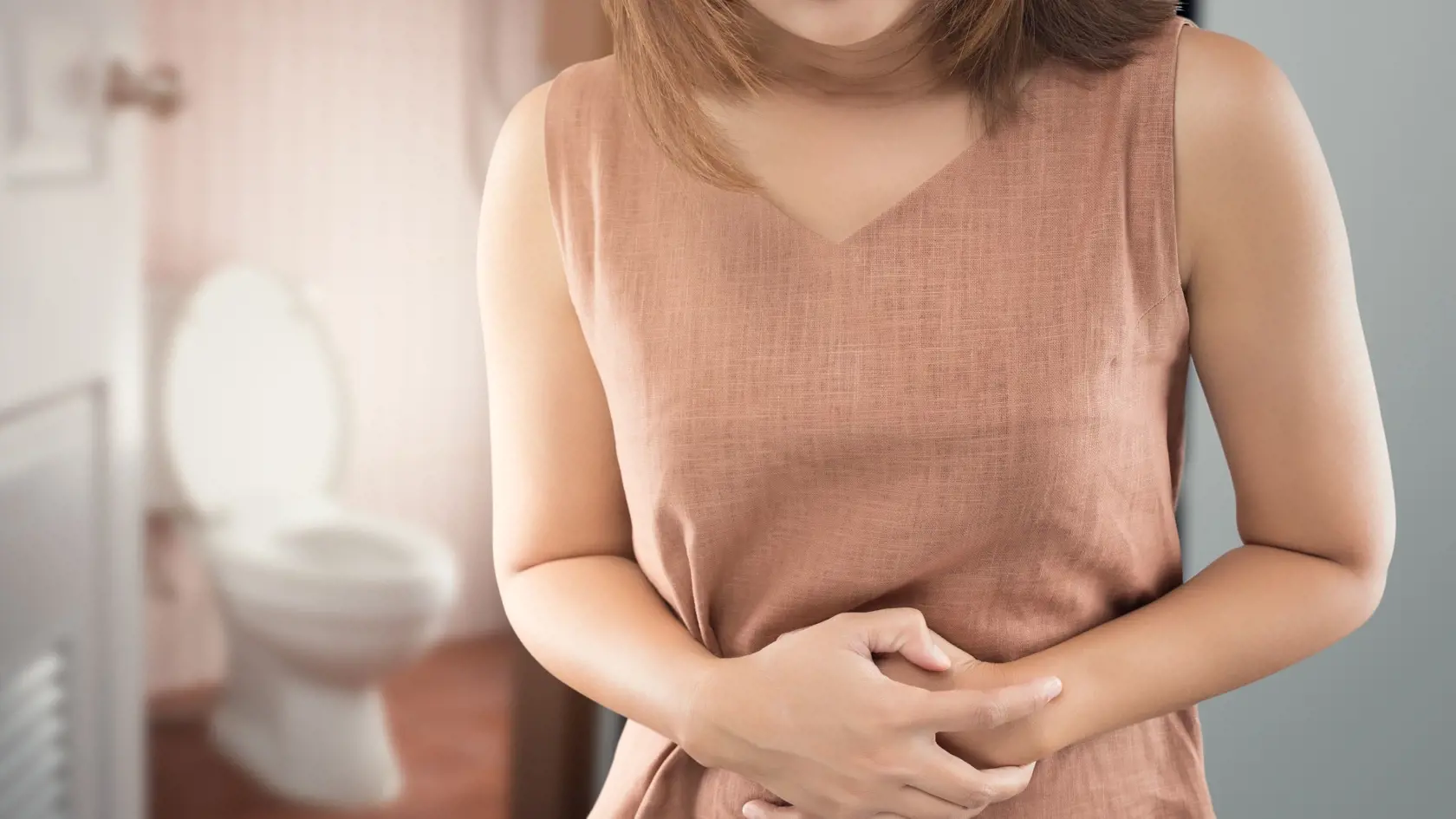 The woman wake up for go to restroom. People with diarrhea problem concept