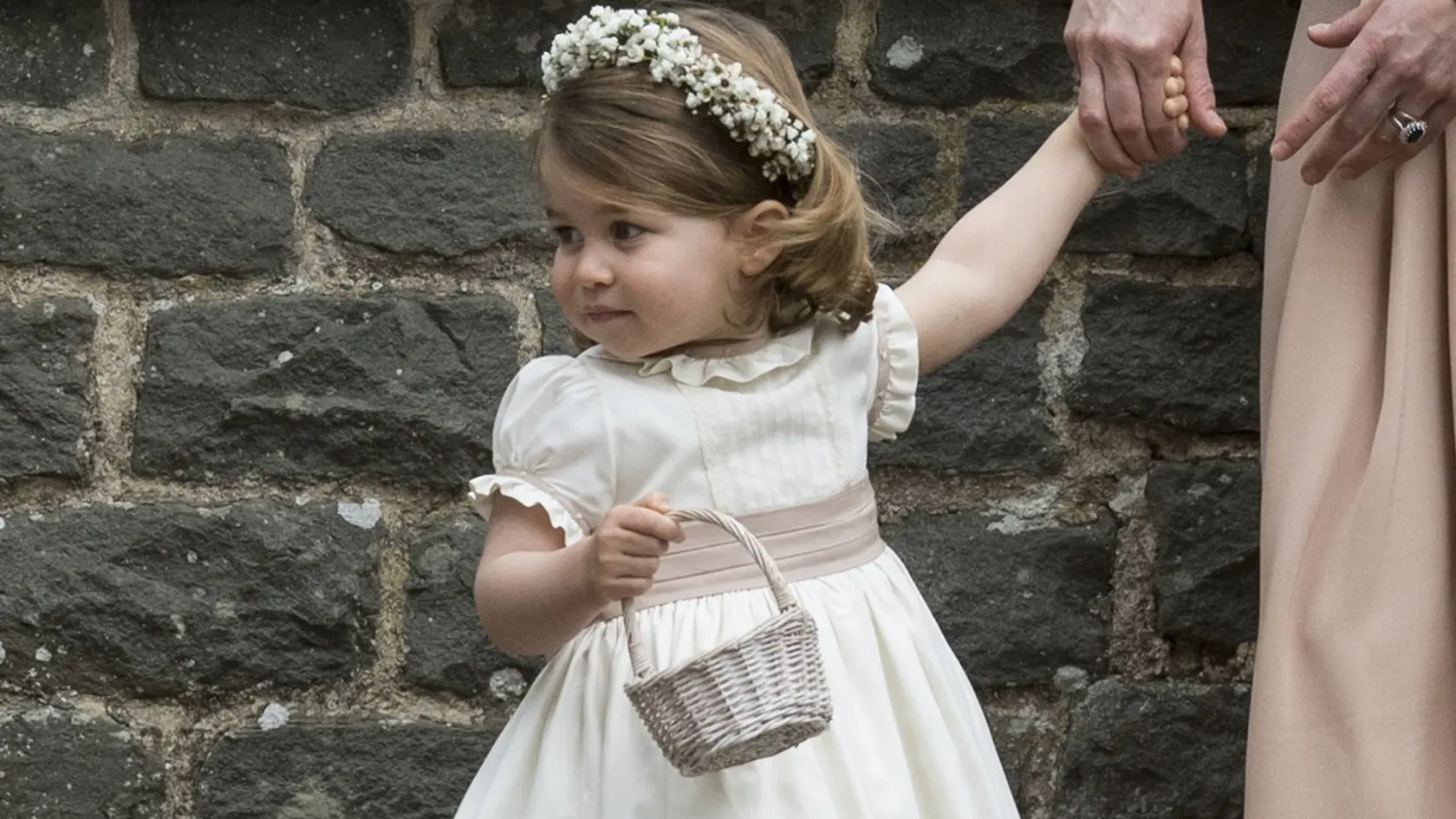 ENGLEFIELD GREEN, ENGLAND - MAY 20:  Princess Charlotte of Cambridge attends the wedding of Pippa Middleton and James Matthews at St Mark's Church on May 20, 2017 in Englefield Green, England.  (Photo by UK Press Pool/UK Press via Getty Images)