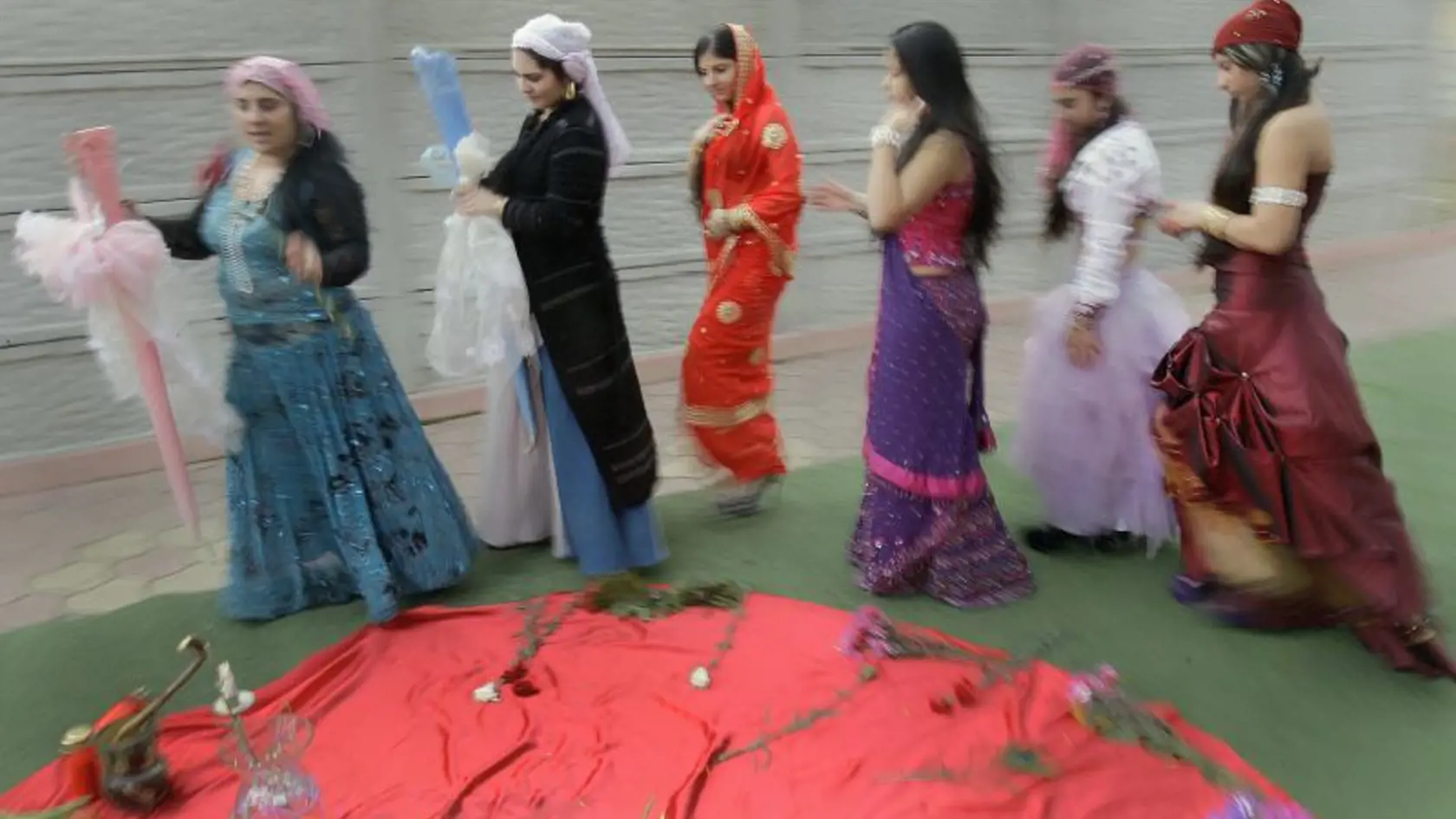 From left Queen witch Mihaela Minca, left, and apprentices Ana, Melisa, Esmeralda, Casanndra and Alice, perform a Valentine's Day ritual in Mogosoaia, Romania, Monday, Feb. 14, 2011. Romanian witches performed a lovers' day ritual crafted to help people find true love. (AP Photo/Vadim Ghirda)