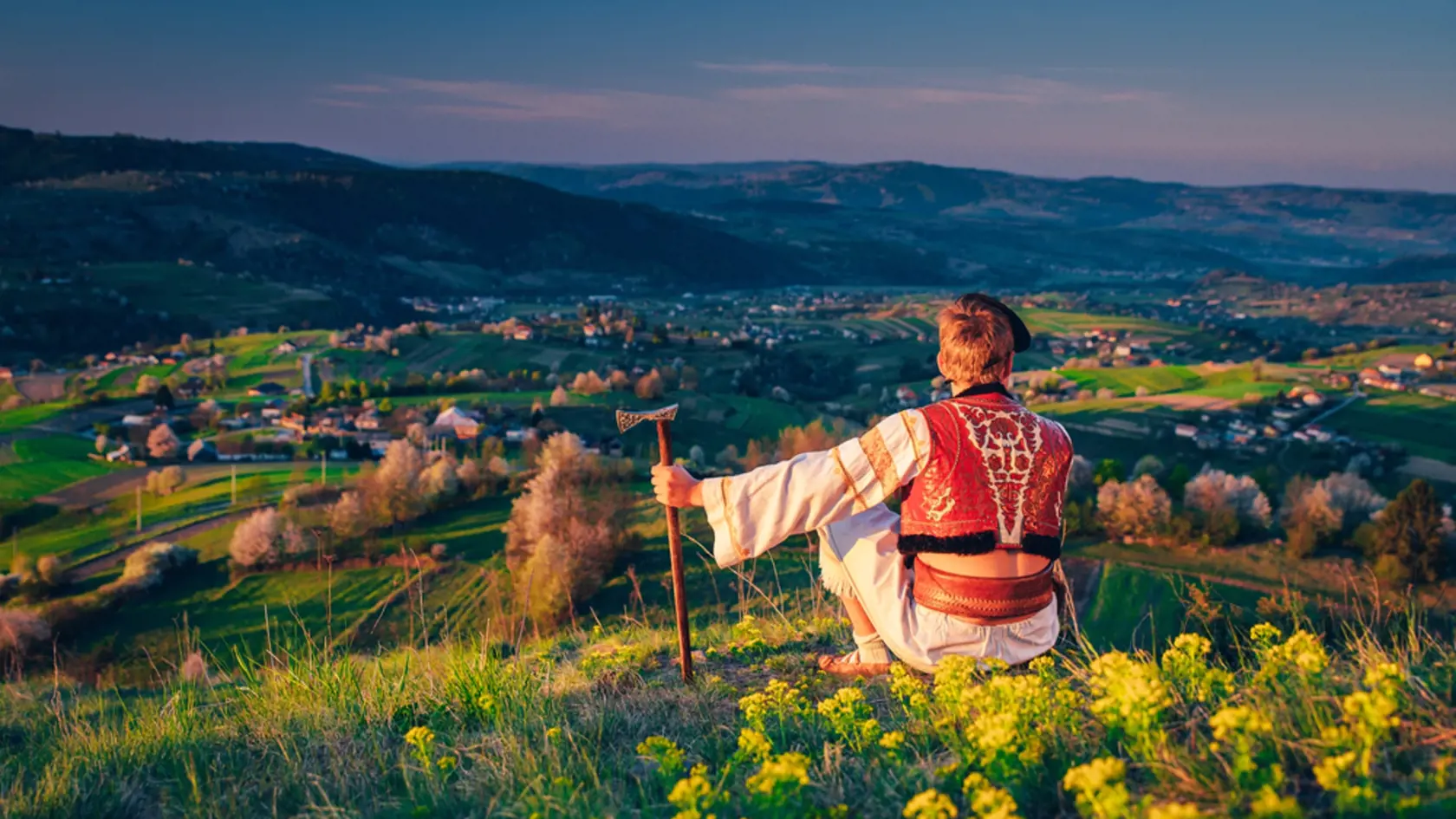 Man,In,Traditional,Slovak,Folk,Dress,Sitting,In,Spring,Nature.