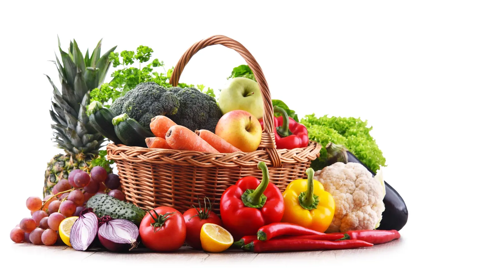 Assorted,Organic,Vegetables,And,Fruits,In,Wicker,Basket,Isolated,On