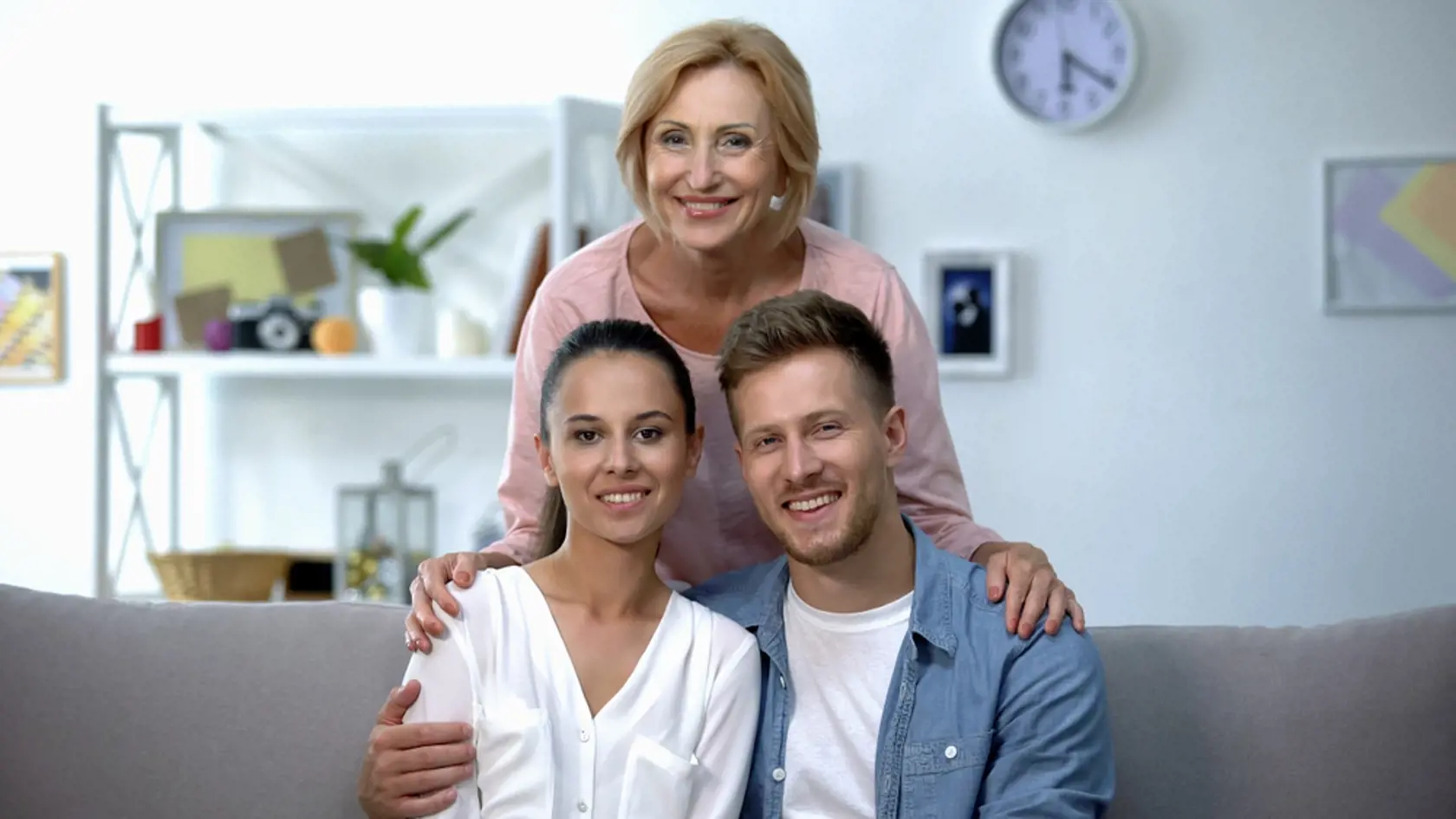 Mother-in-law,Embracing,Son,And,His,Wife,,Happy,Family,Relationship,Concept