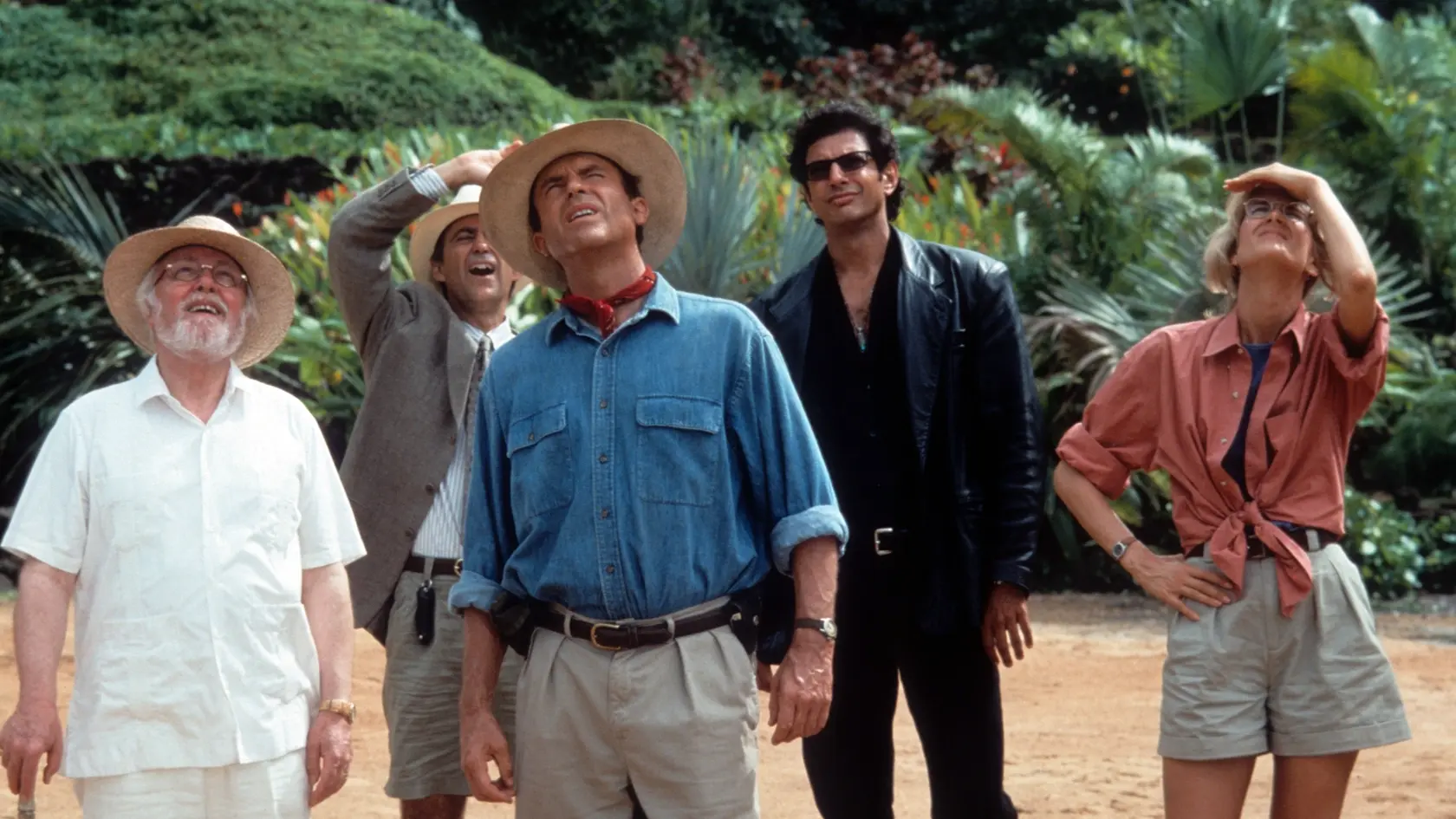 From left to right, Richard Attenborough, Martin Ferrero, Sam Neill, Jeff Goldblum and Laura Dern look up in a scene from the film 'Jurassic Park', 1993. (Photo by Universal/Getty Images)