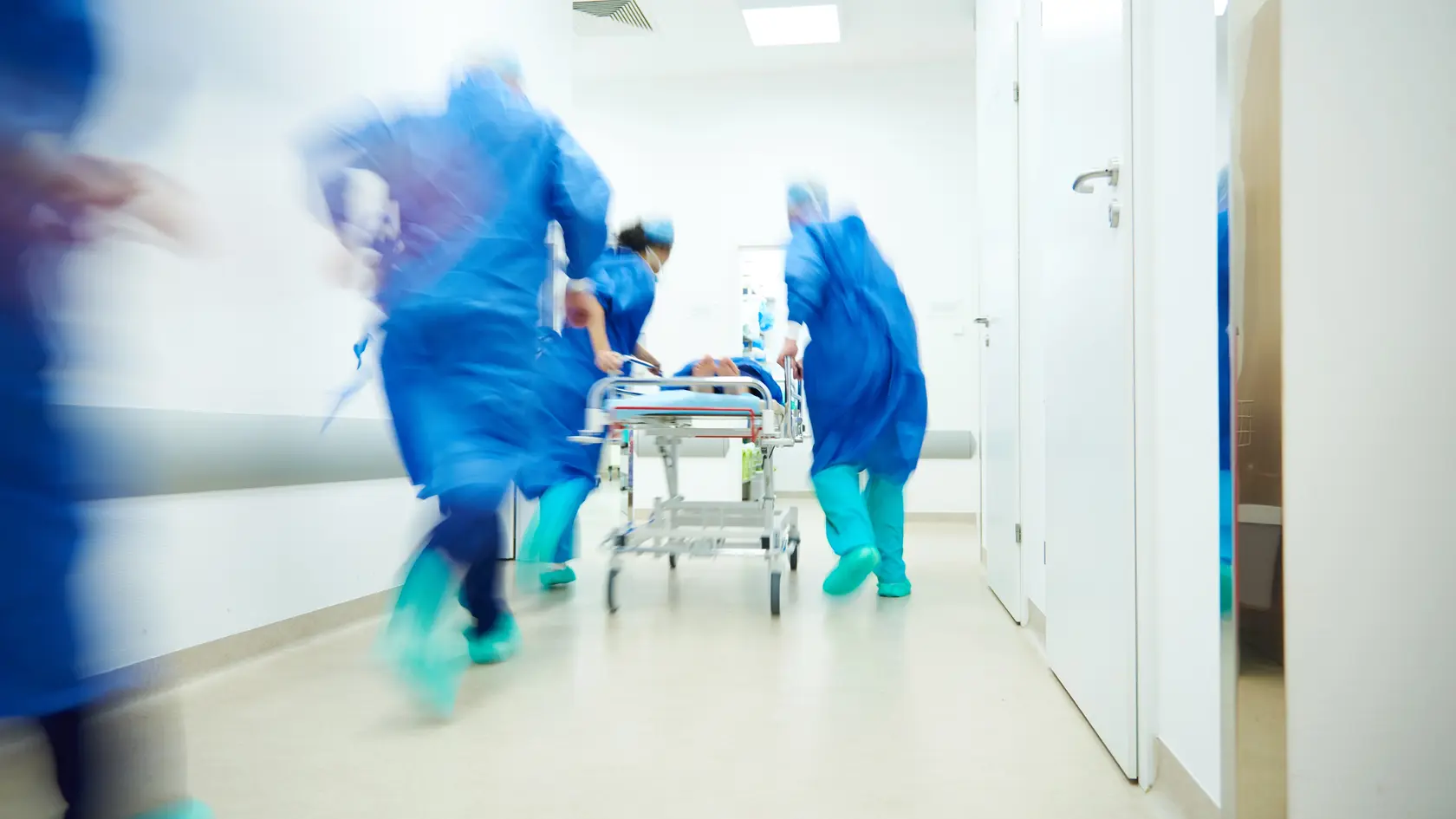 Doctors running for the surgery