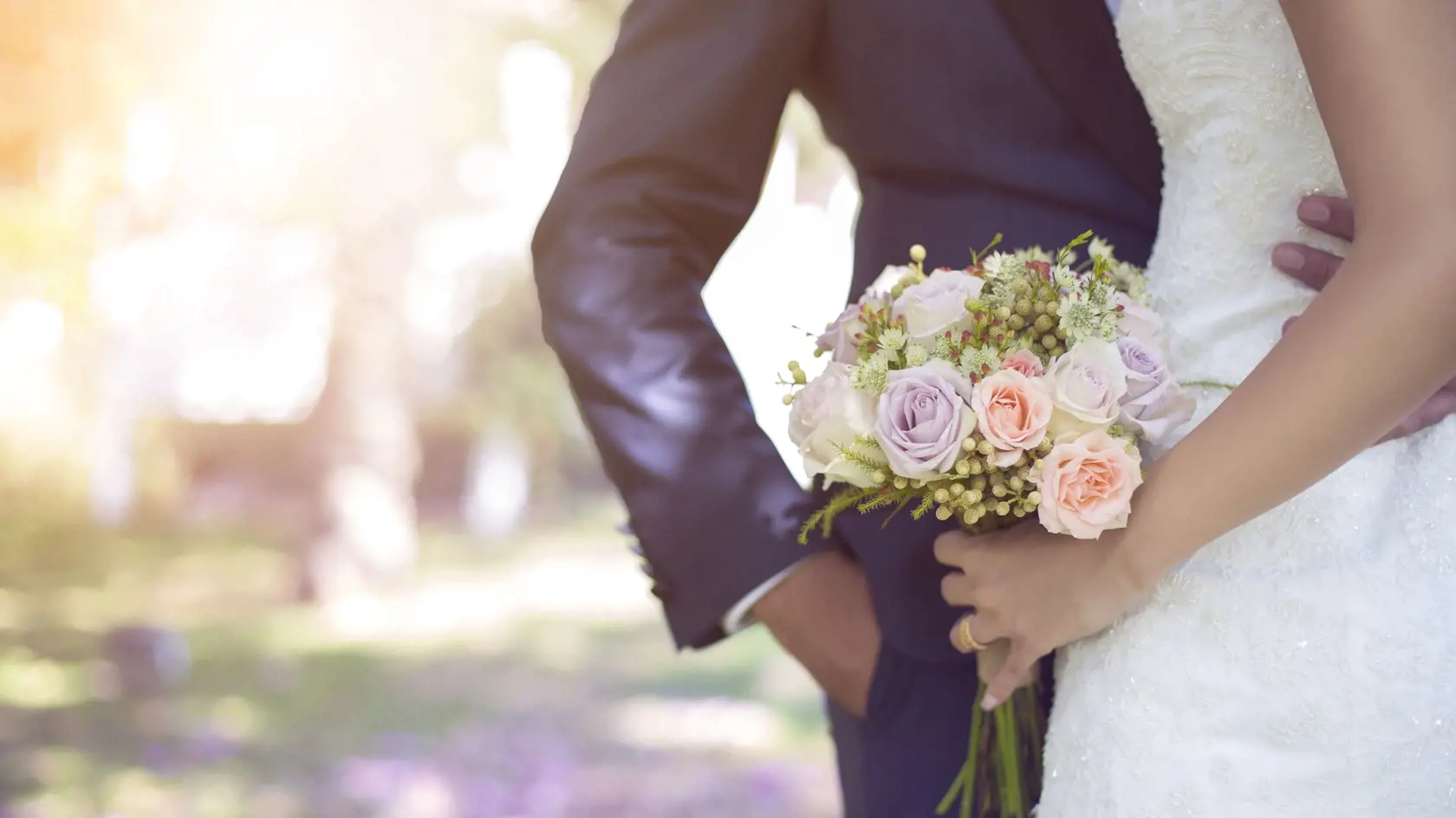 Bride holding bouquet.