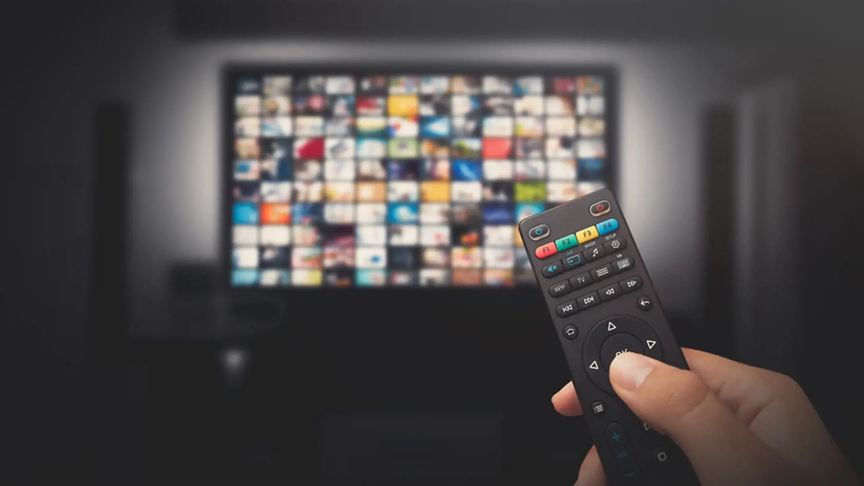 Multimedia,Video,Concept,On,Tv,Set,In,Dark,Room.,Man