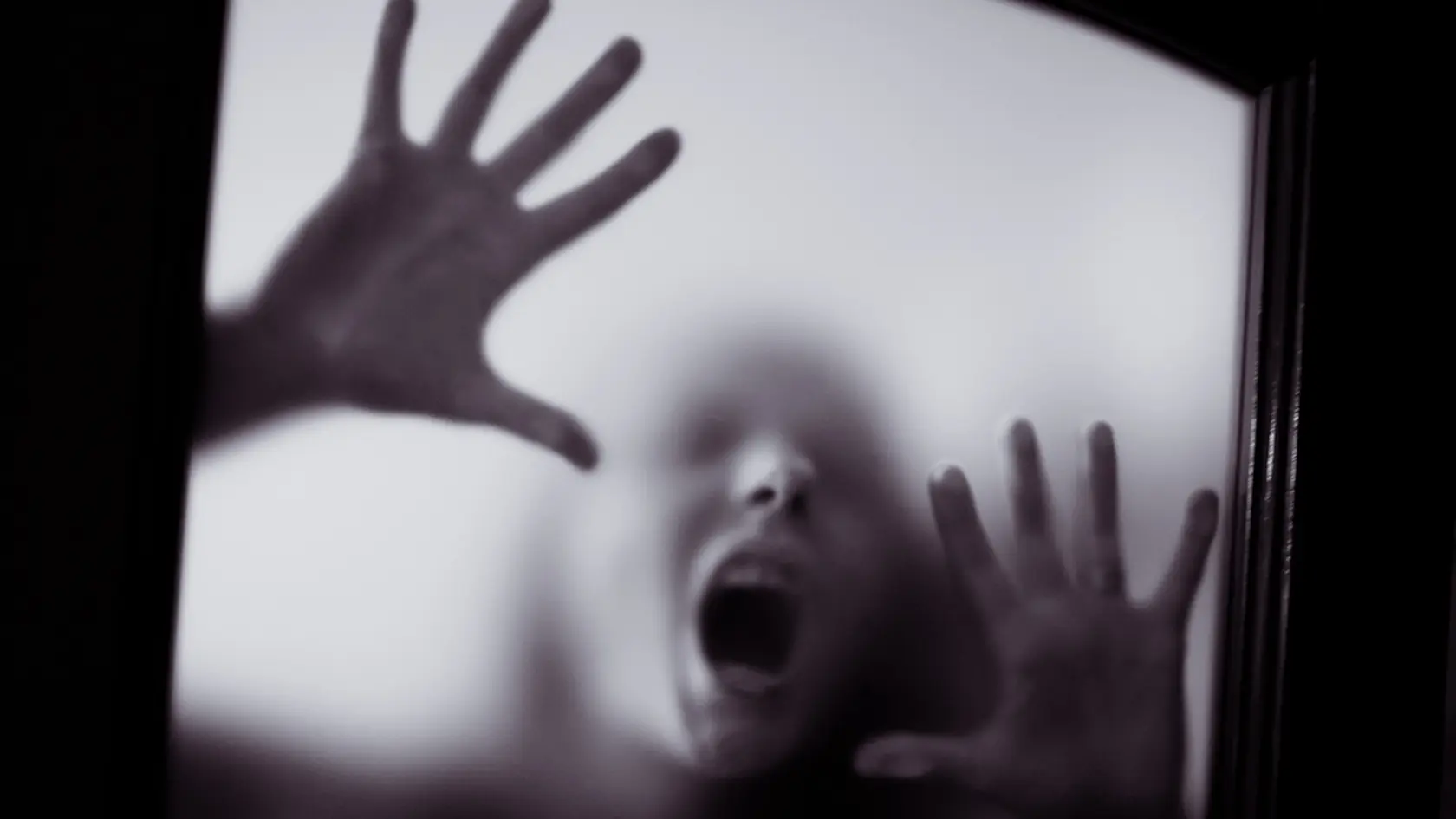 scary picture of hands behind glass, horror ghost woman behind door, Halloween concept