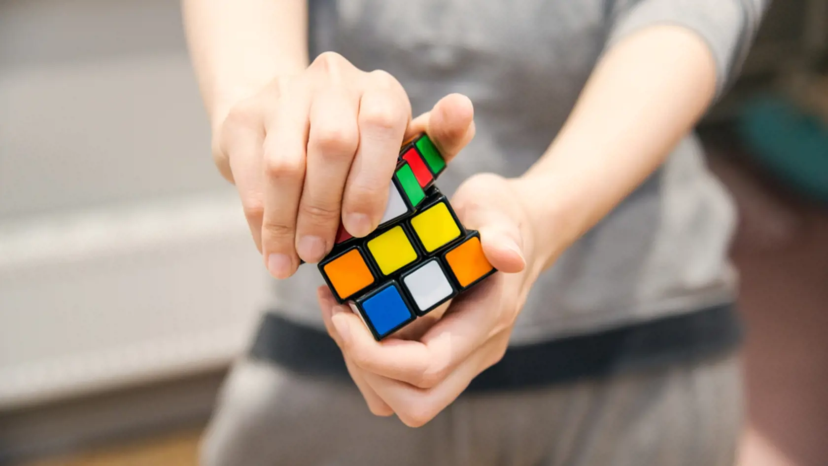 Female,Hands,Holding,A,Rubik's,Cube