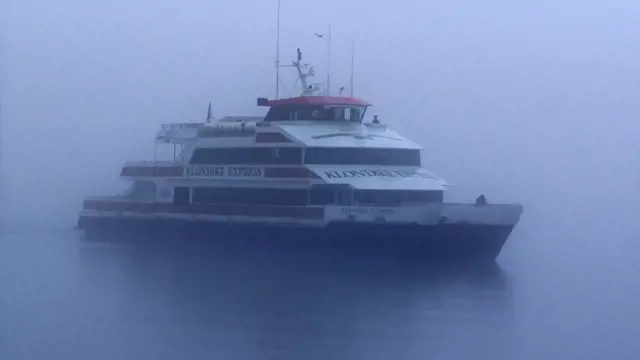 A ship in the fog.