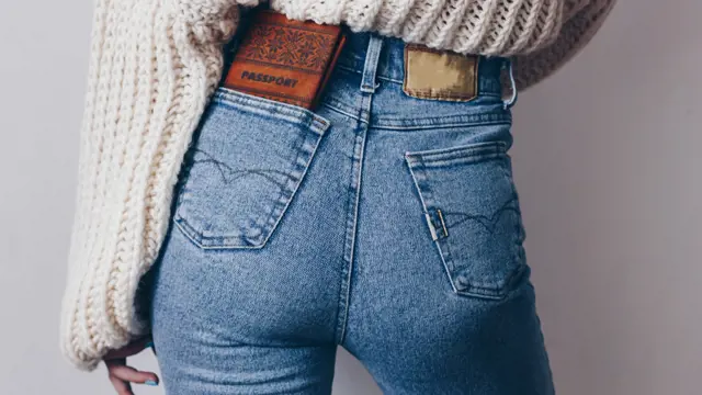 Fit,Female,Butt,In,Jeans,With,Passport,In,Pocket,And