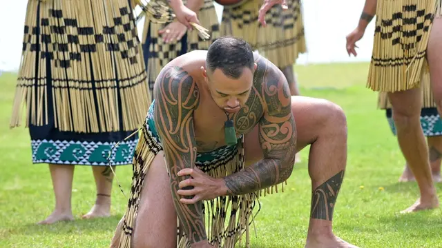 WAITANGI, NZL - FEB 06 2025:Maori man dancing traditional Haka dance on Waitangi Day, the national day of New Zealand, marks the anniversary of the 1840 Treaty of Waitangi