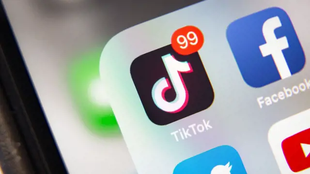 Tyumen, Russia - January 21, 2020: TikTok and Facebook application  on screen Apple iPhone XR